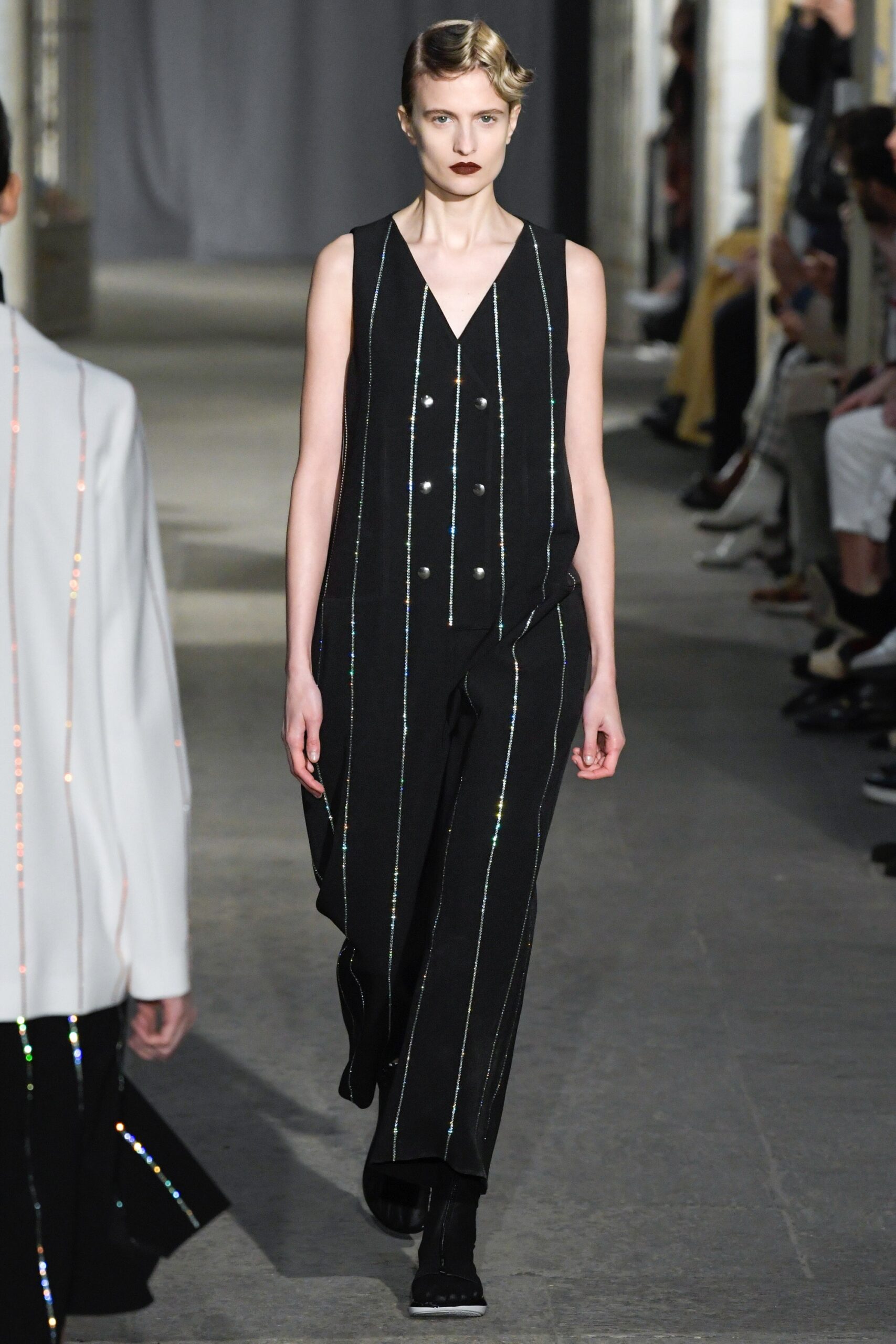 black fitted sleeveless jumpsuit