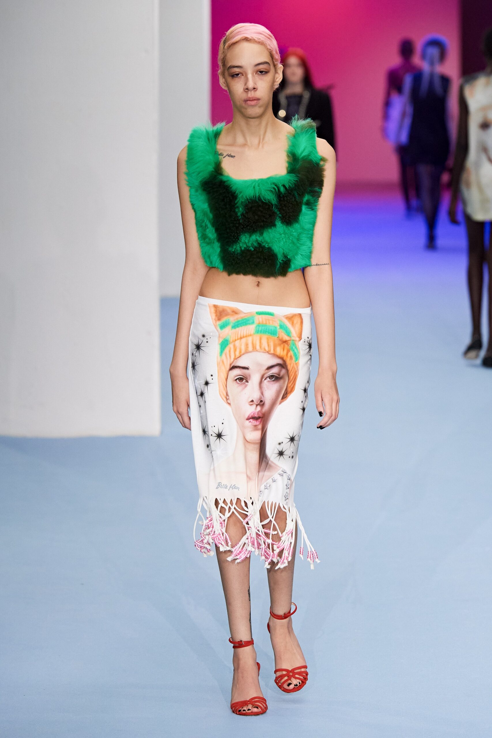green fur sleeveless fitted top