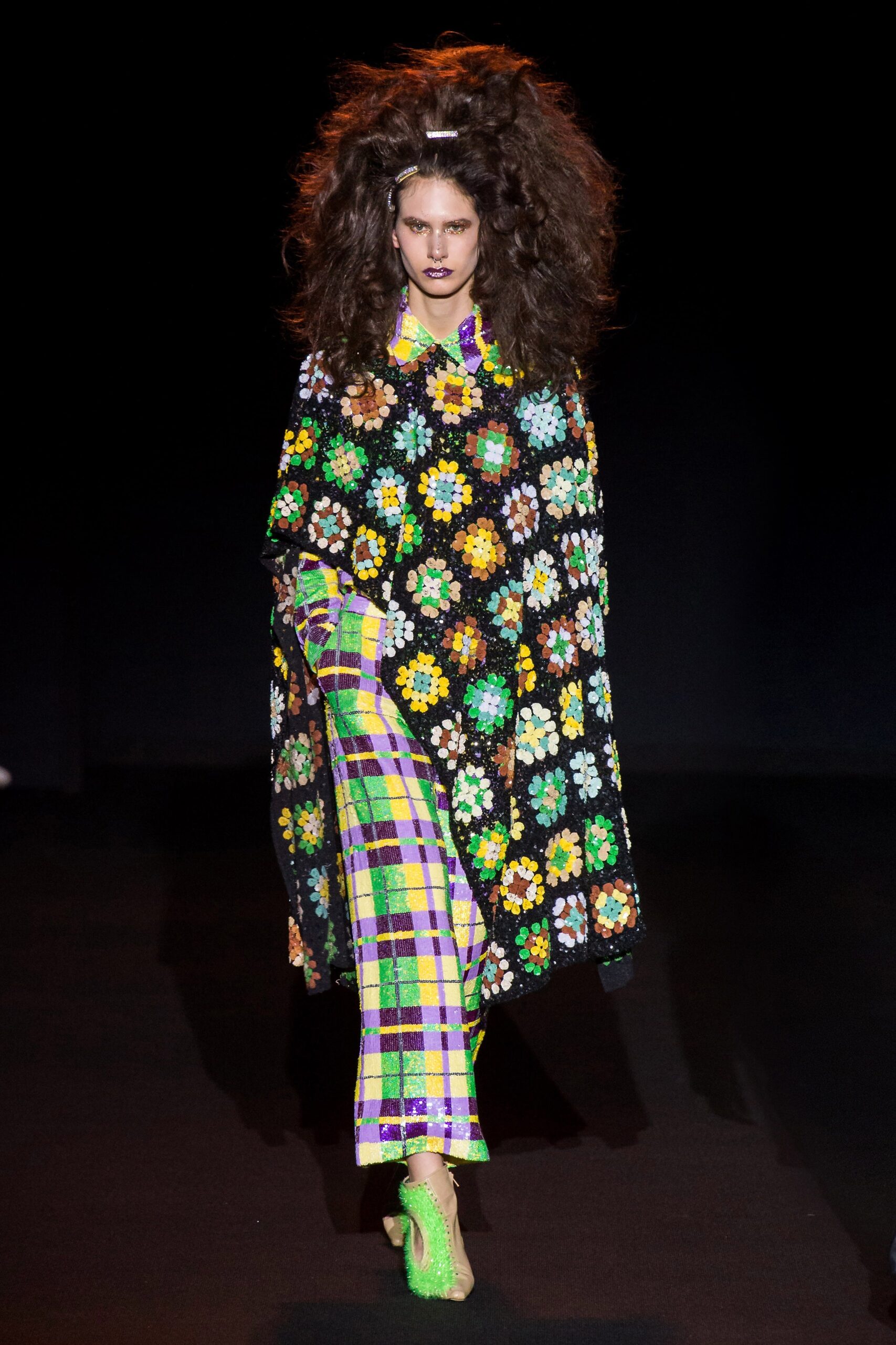 floral poncho and checked pants