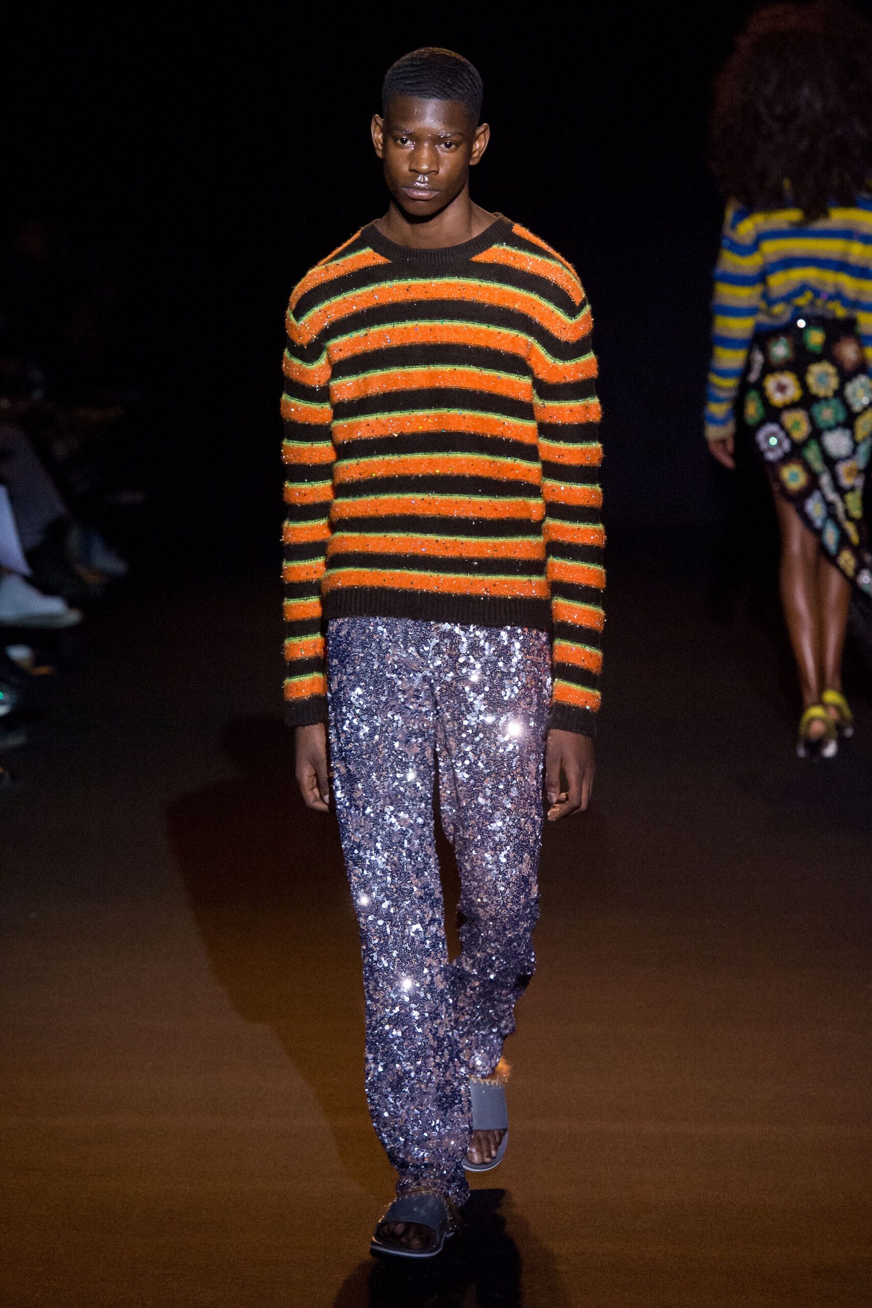 striped sweater with sequin pants