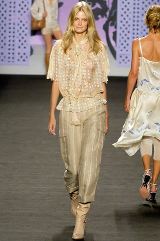 beige silk blouse with gold pants