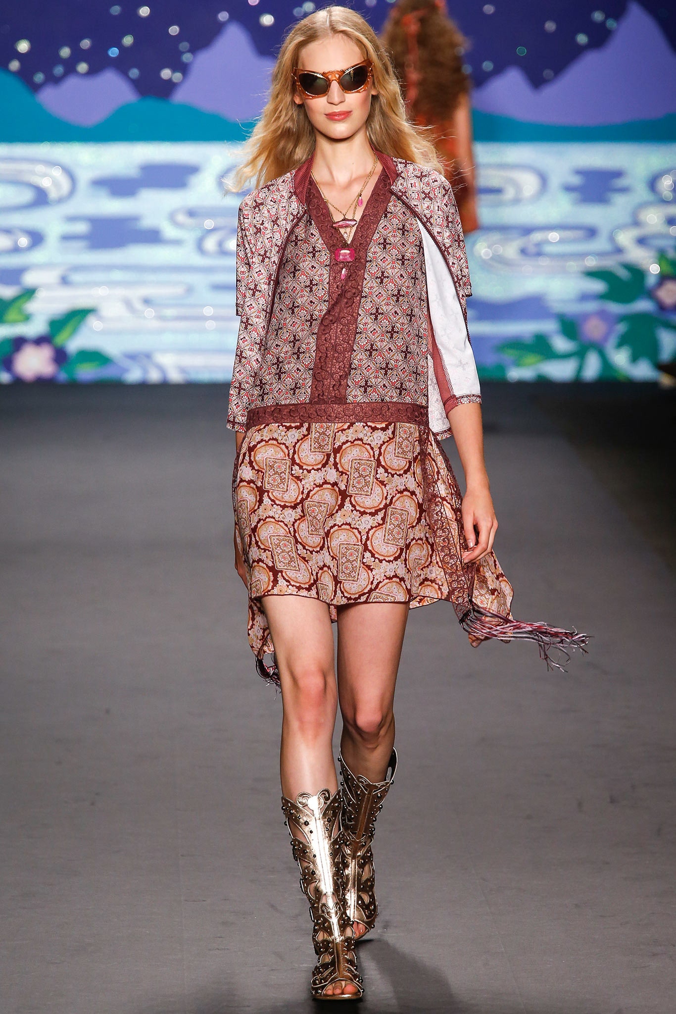 red and brown mini dress with cape