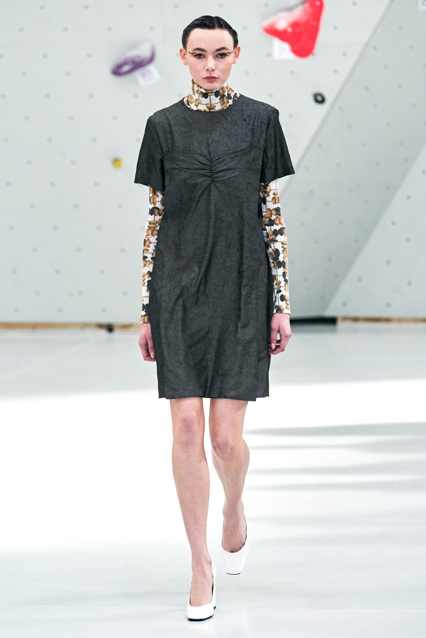 black fitted dress with multi-colored top
