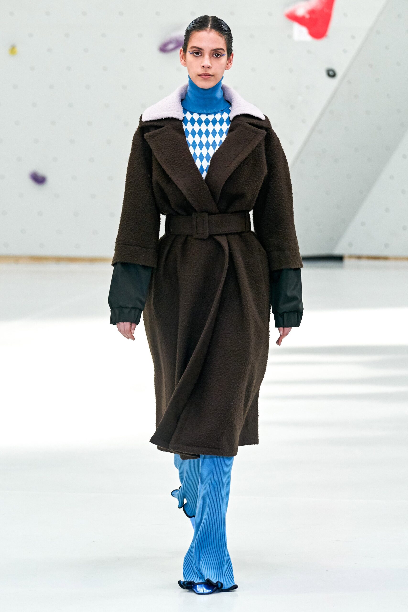 brown wool belted coat and blue top