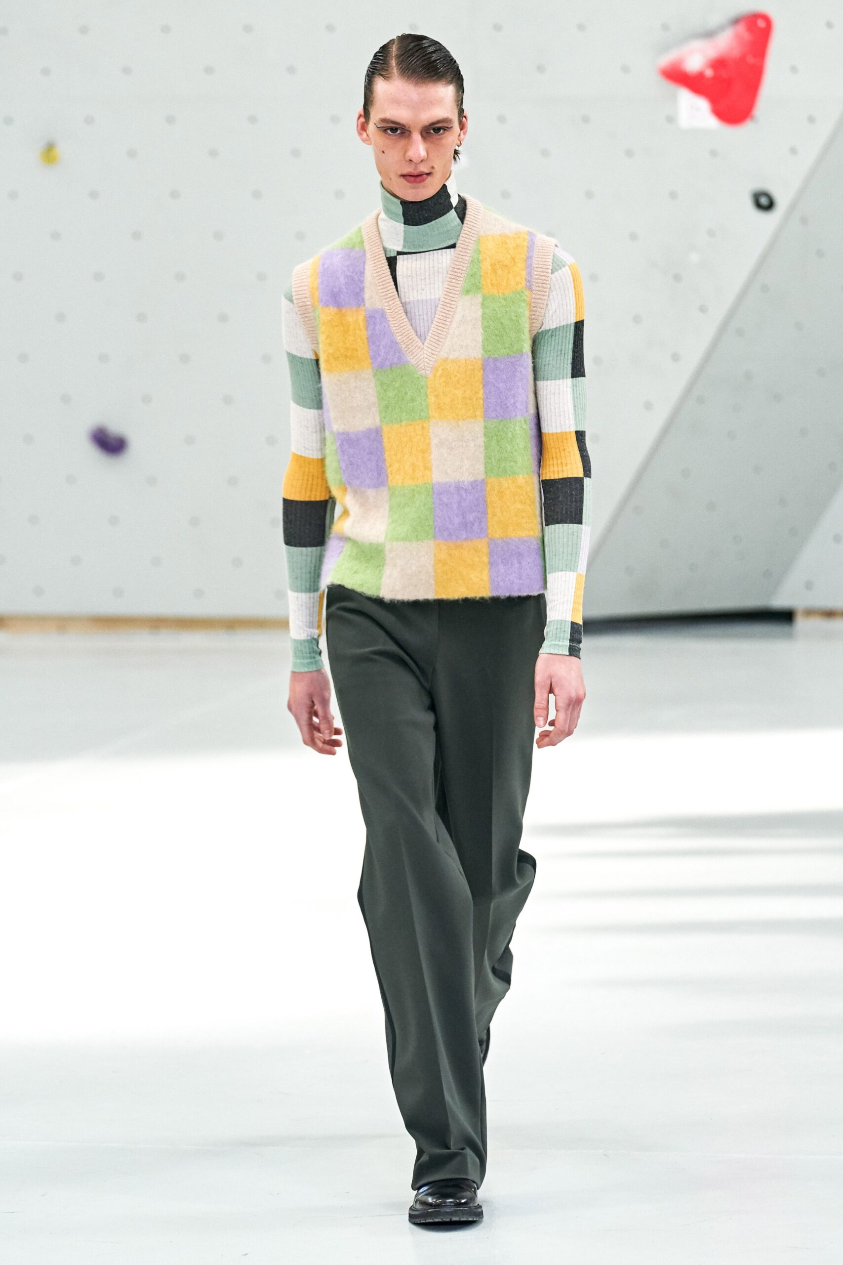 color-blocked sleeveless sweater and tailored pants