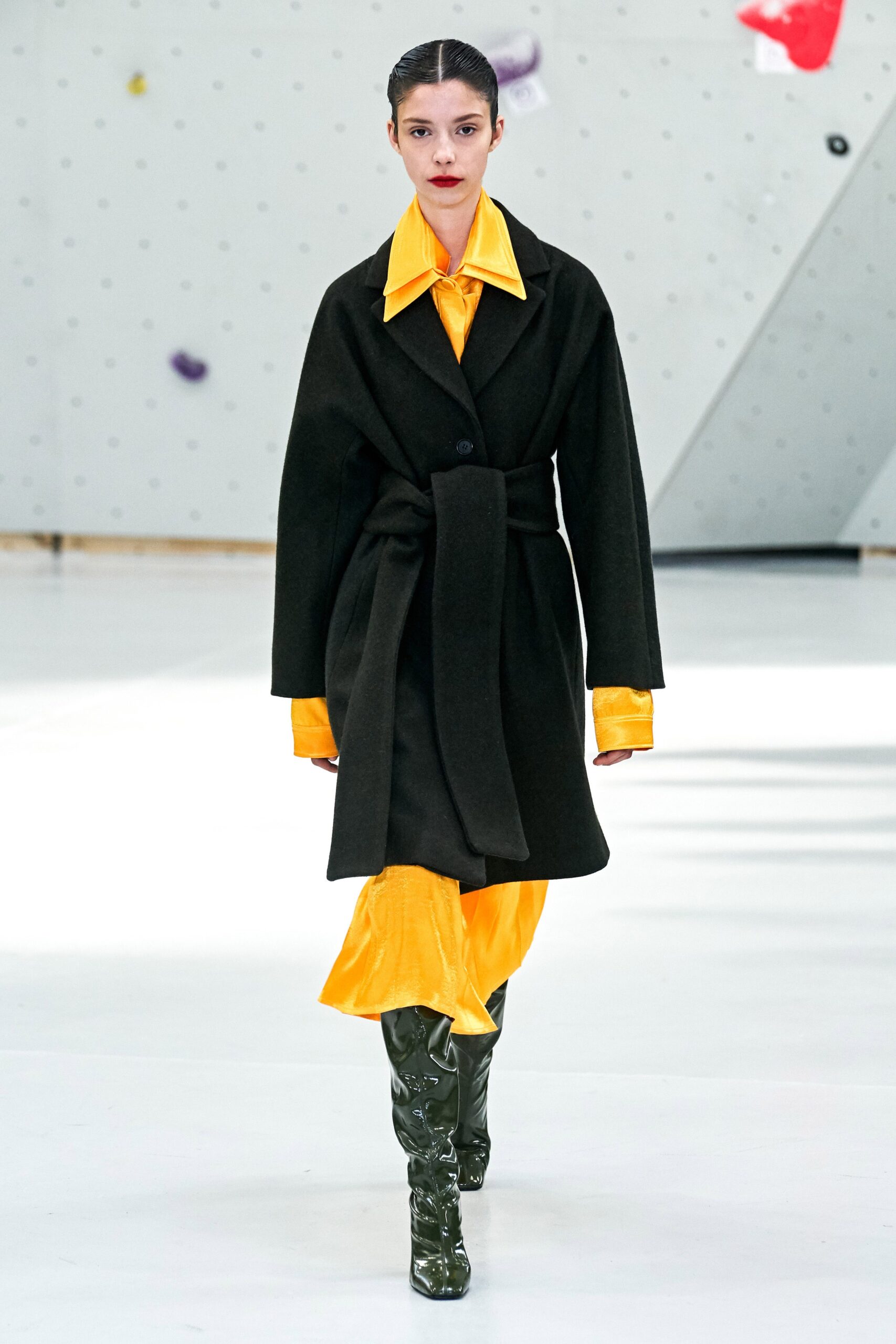 black wool coat with yellow dress