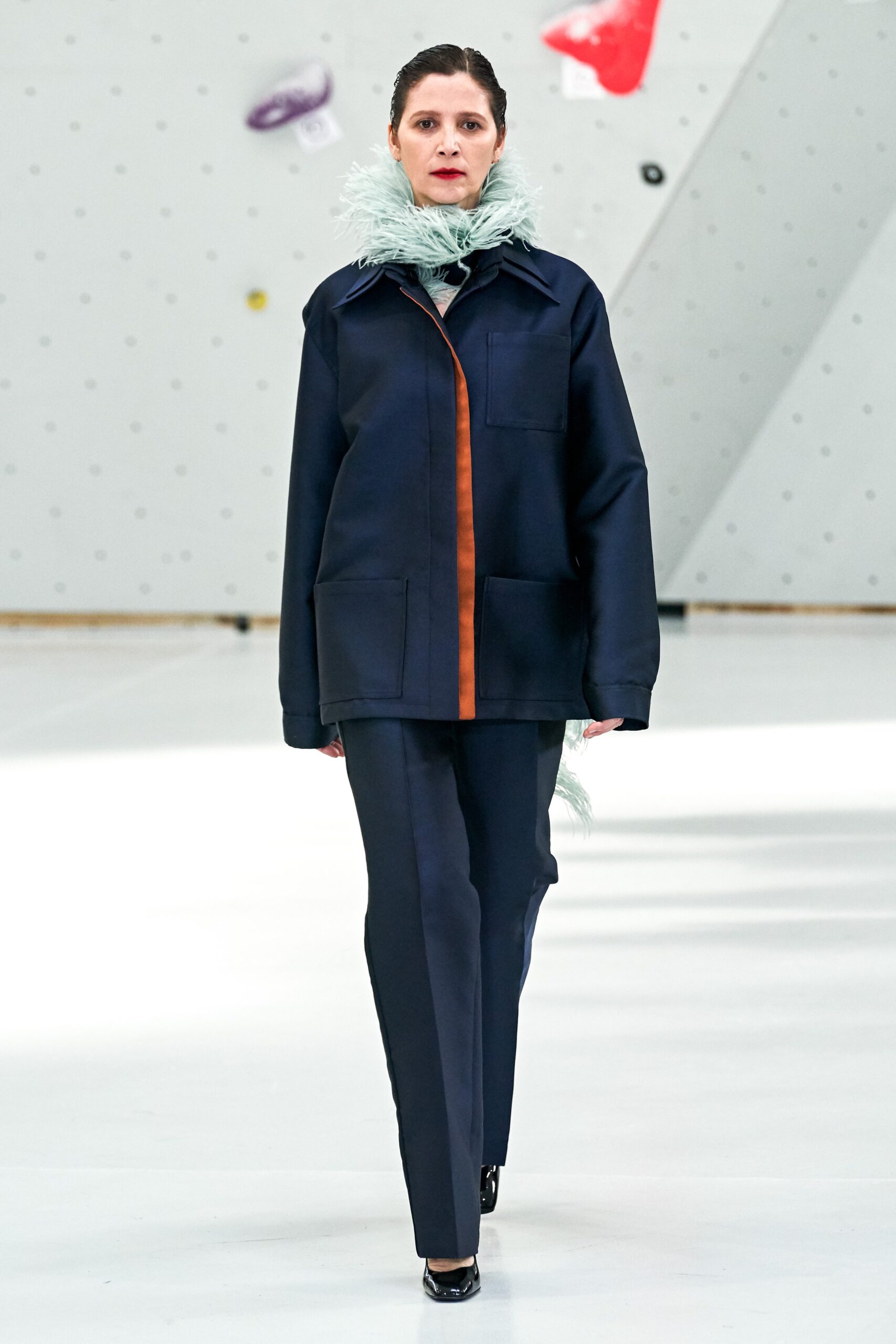 navy jacket with orange detail