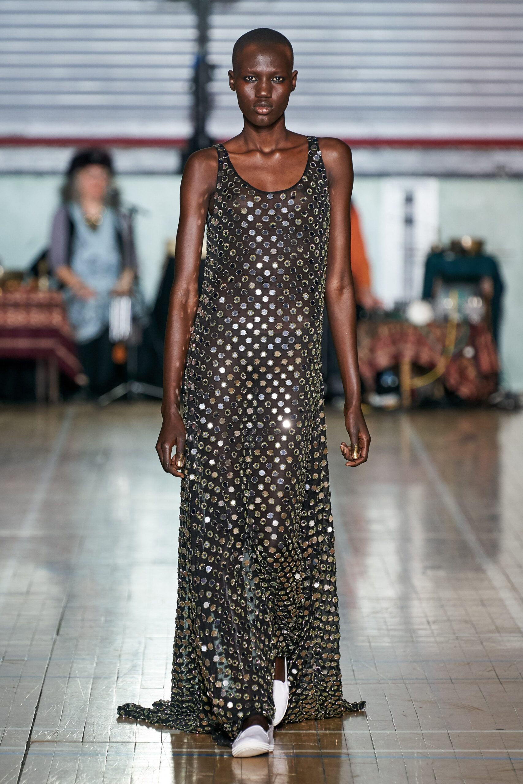 black sequined sleeveless gown