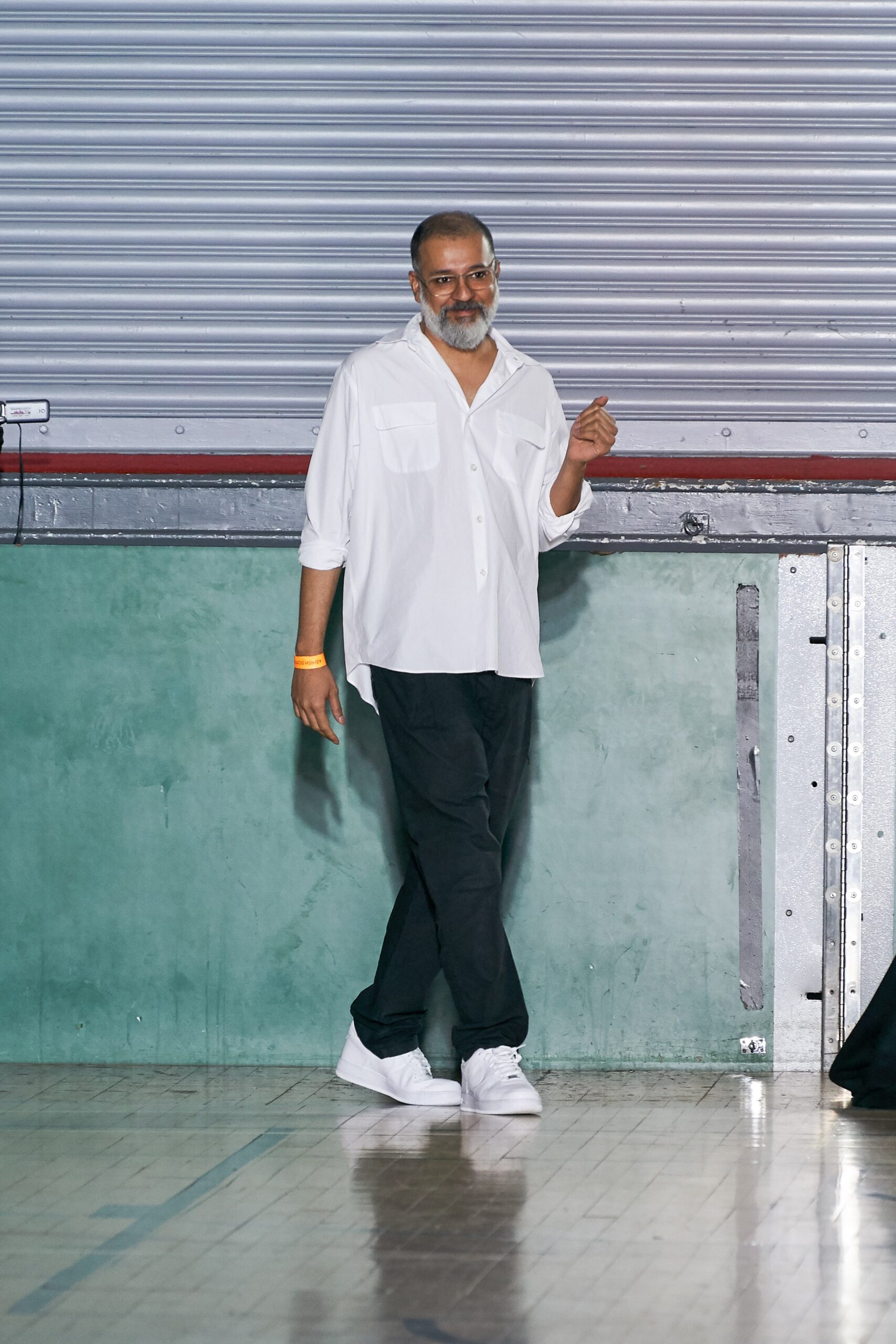 white relaxed shirt with black pants