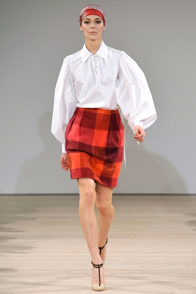 white fitted shirt and checked skirt