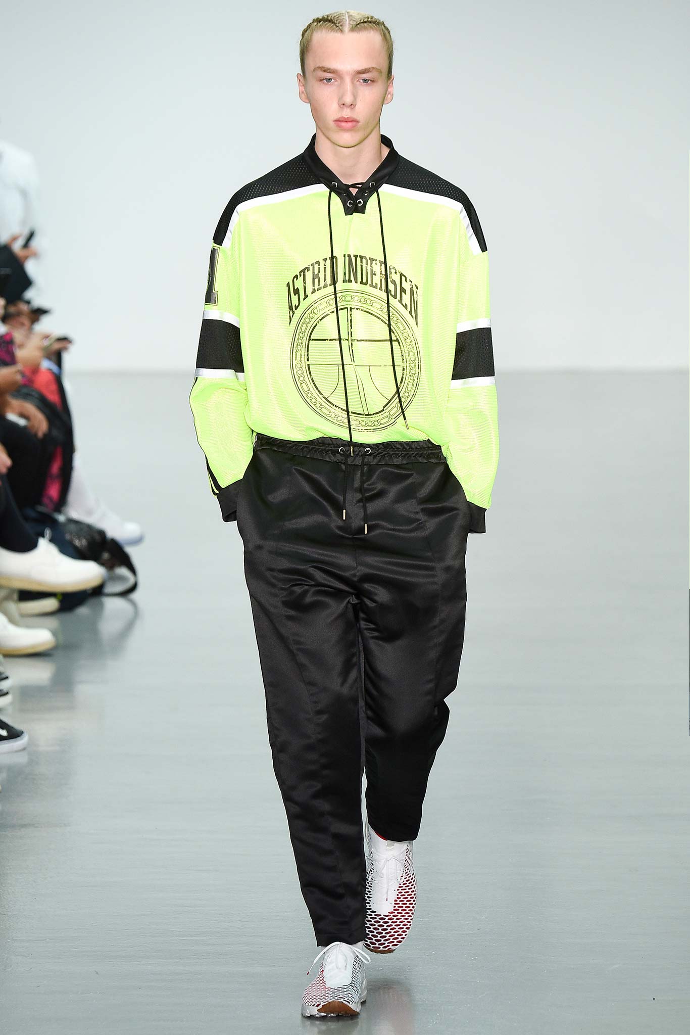 neon green hoodie and black pants