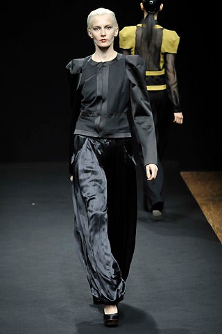 black silk fitted top and relaxed pants