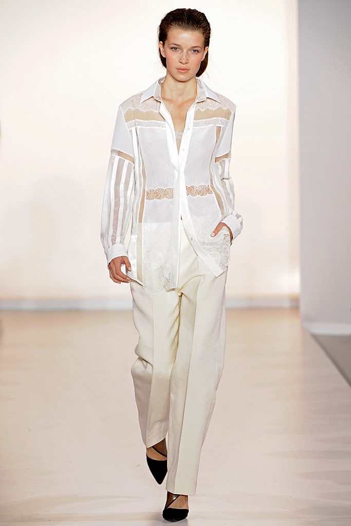 white relaxed shirt with beige pants