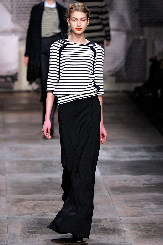 striped top and black midi skirt