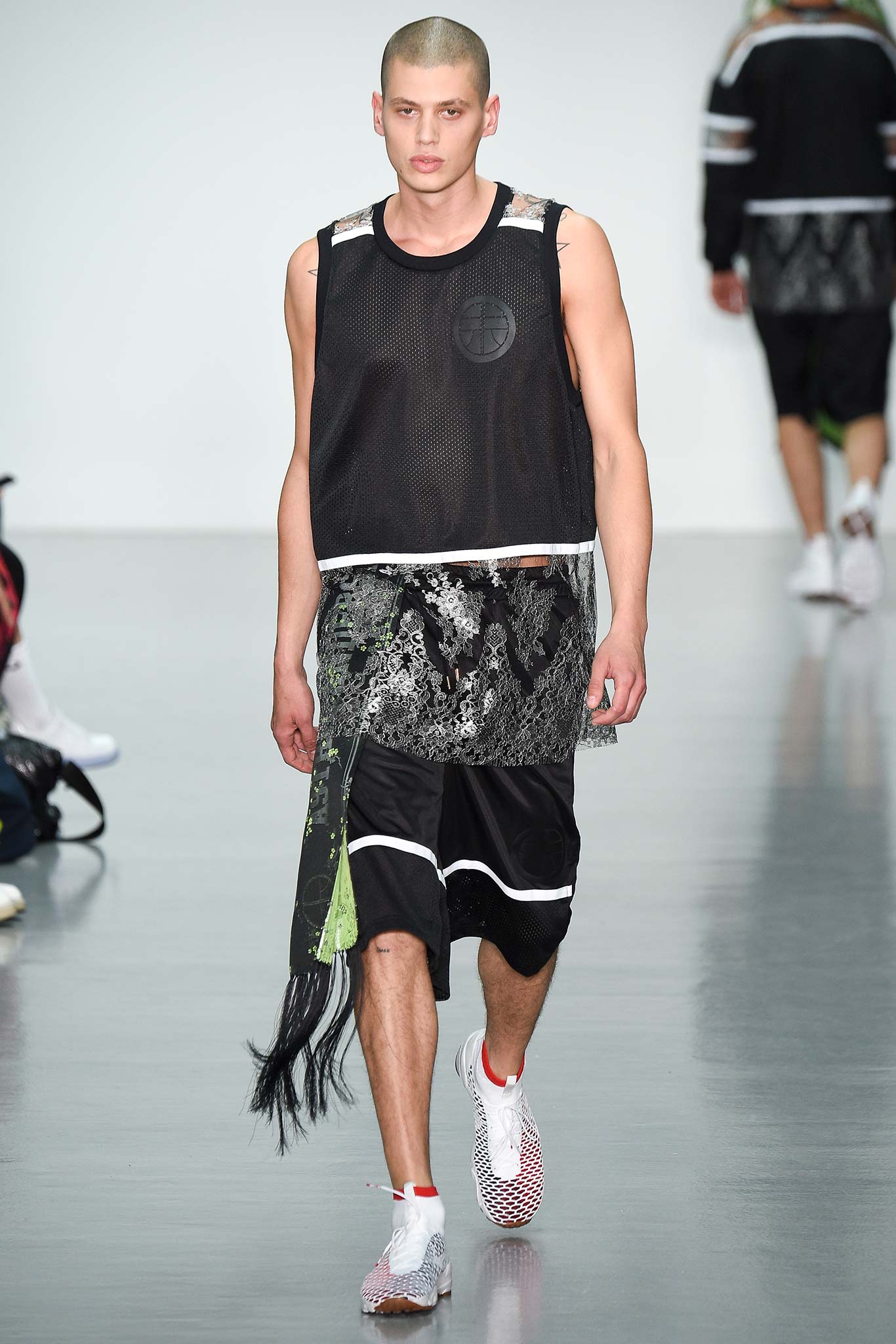 black mesh top and asymmetric skirt