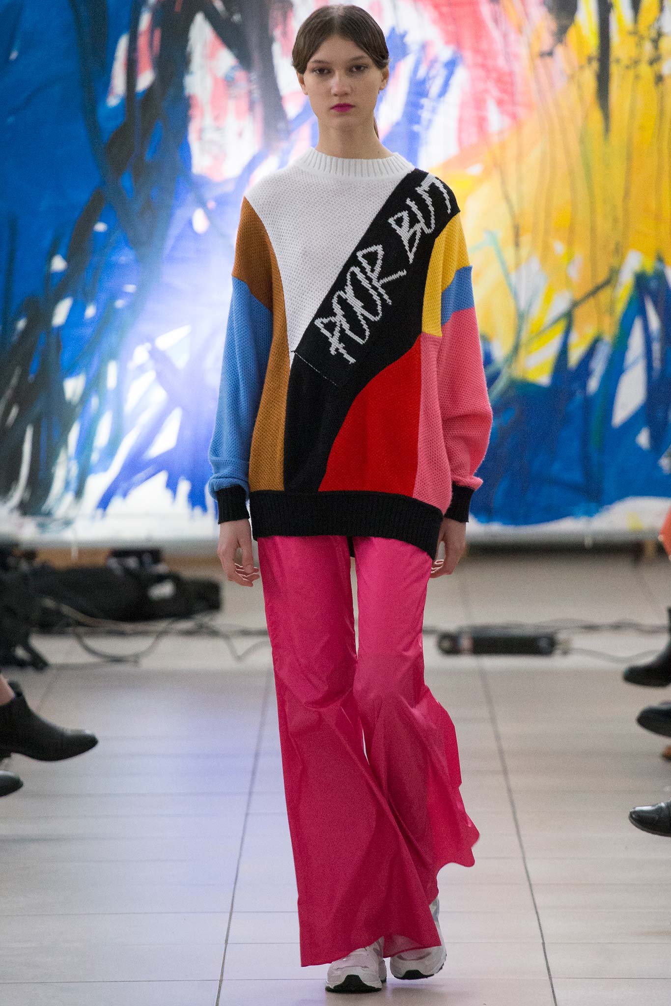 color-blocked sweater and flared pants