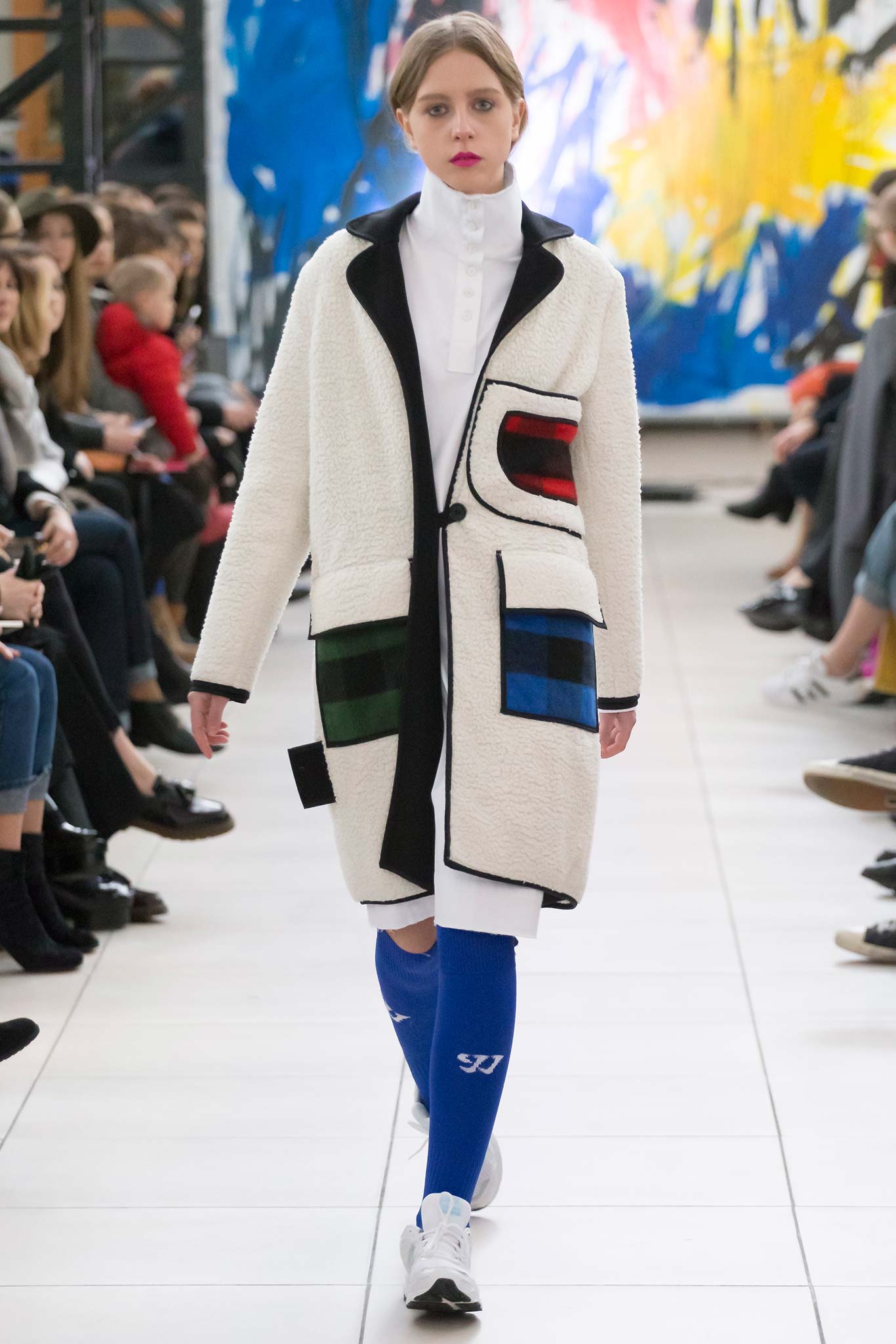 white wool coat with colorful details