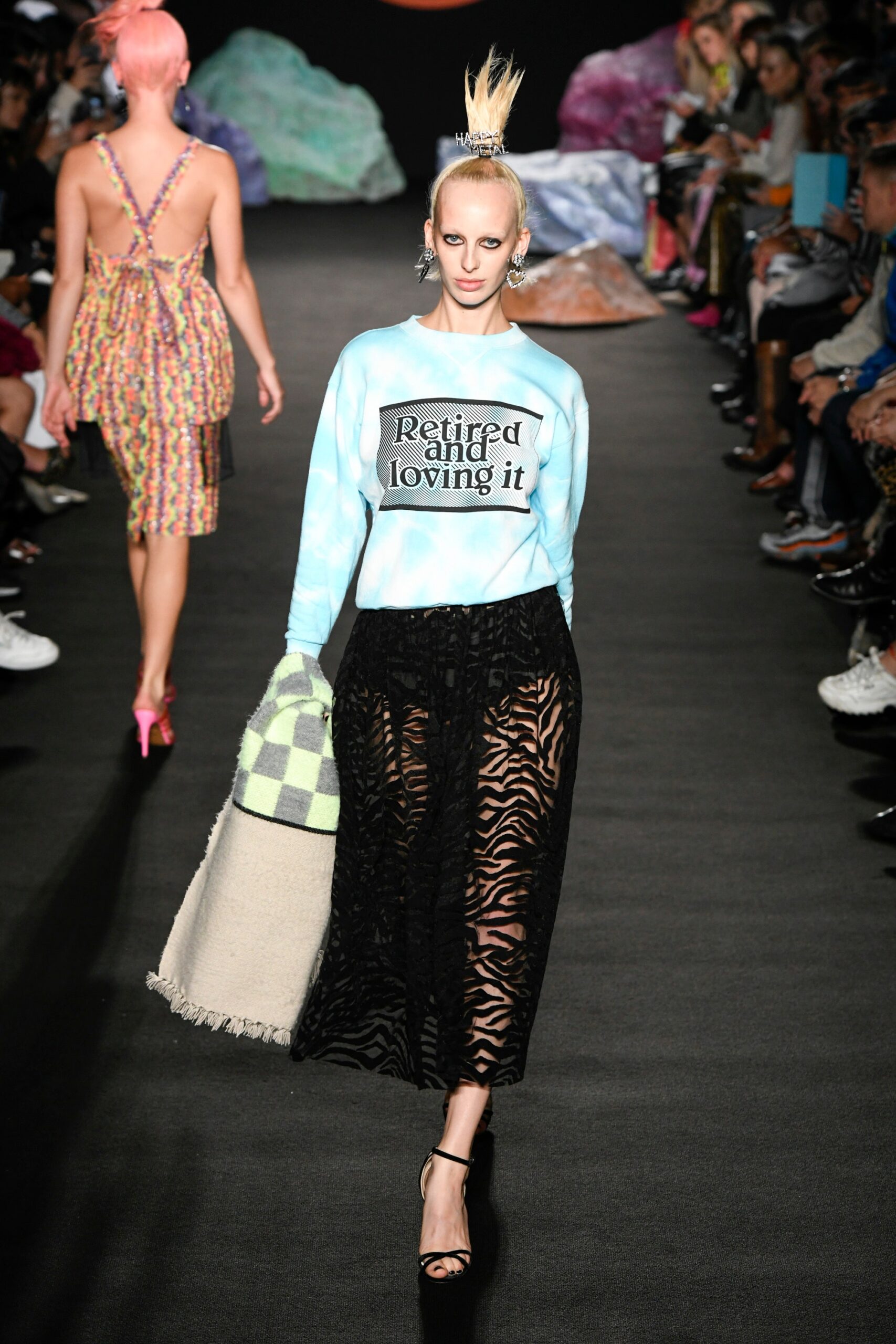 blue relaxed top with black skirt