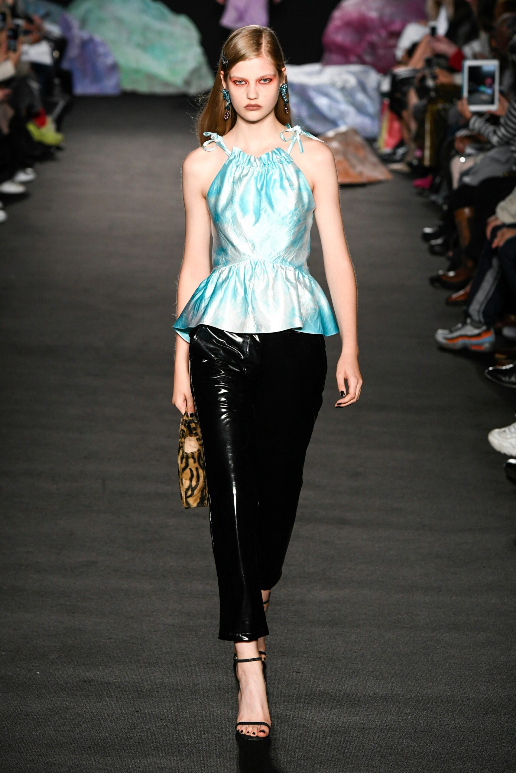 blue silk fitted top with black pants