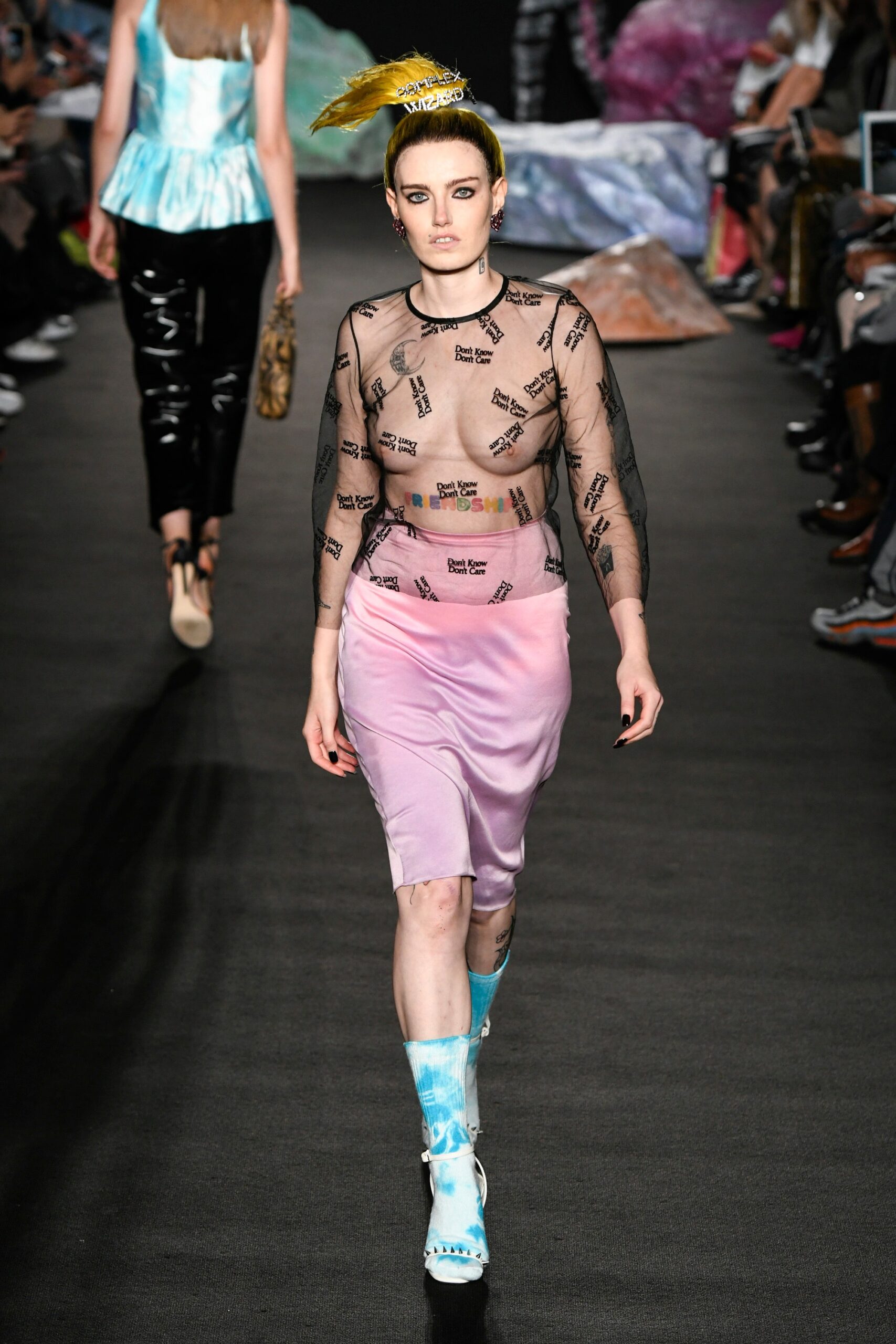 black mesh top with pink skirt
