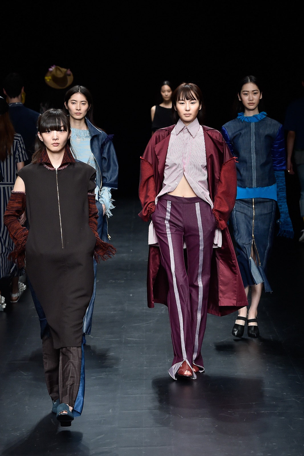 black relaxed dress and purple fitted pants