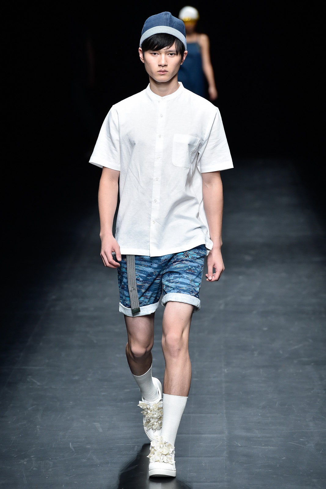 white cotton shirt with blue shorts