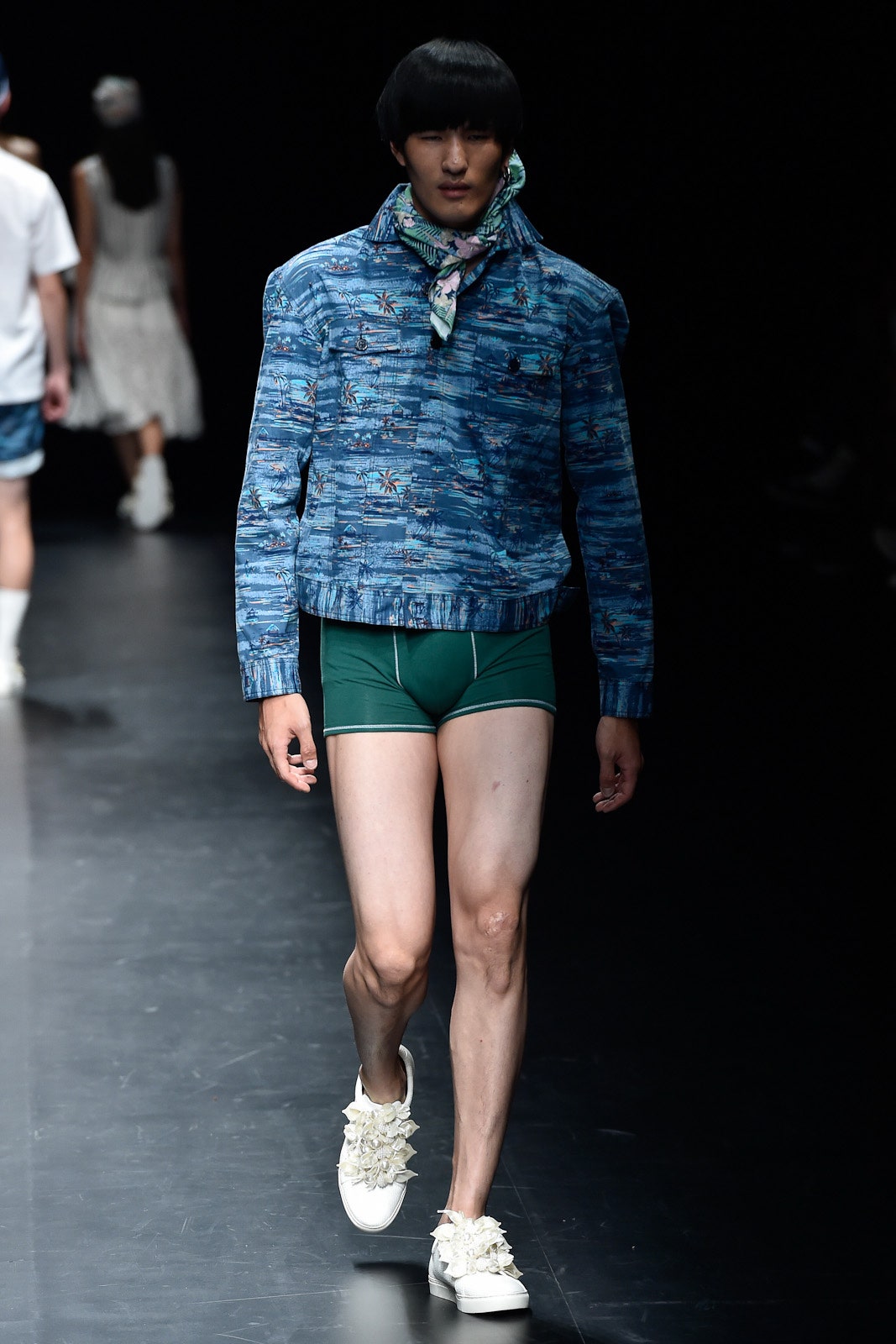 blue fitted jacket with green shorts