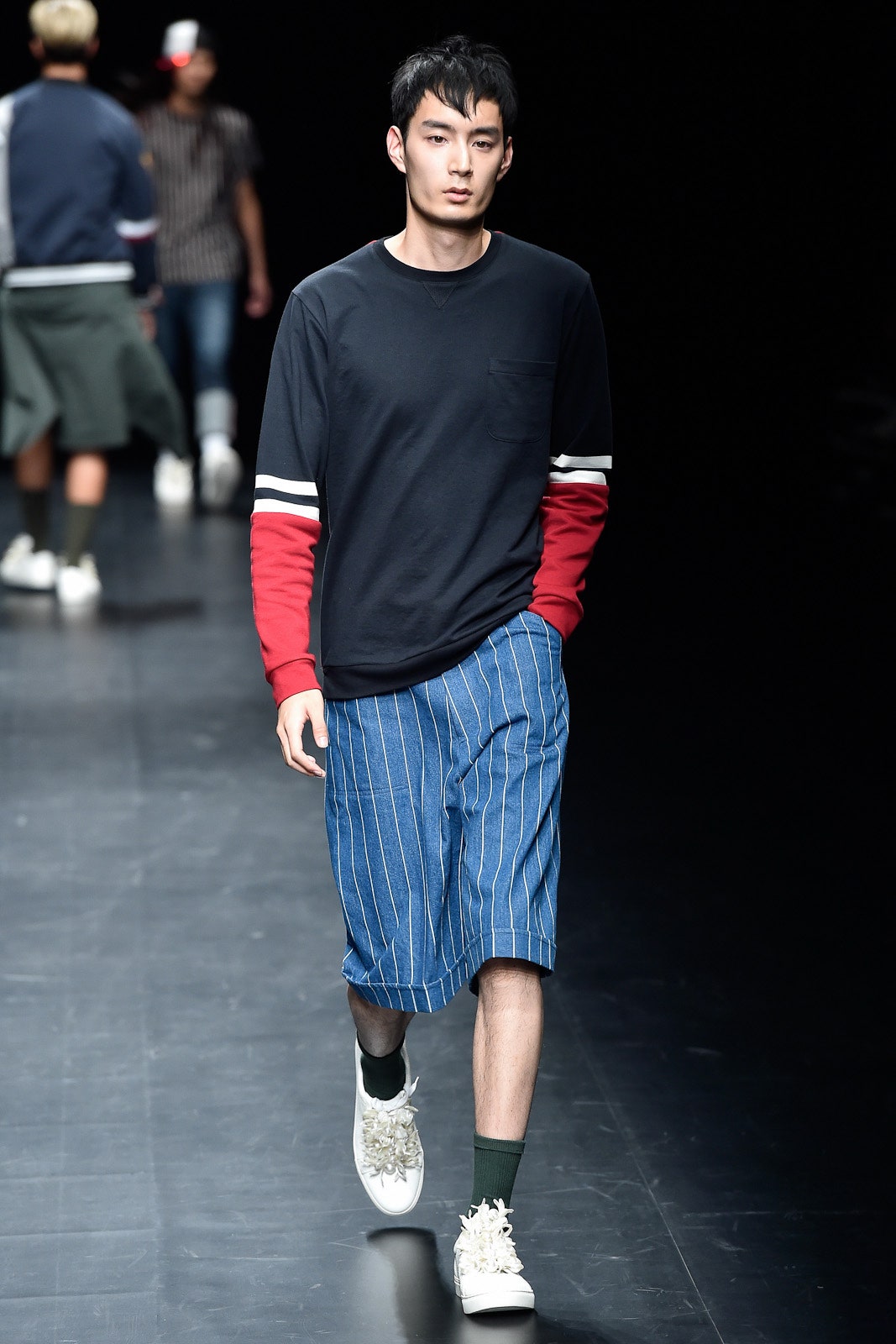 black and red relaxed t-shirt with blue striped shorts