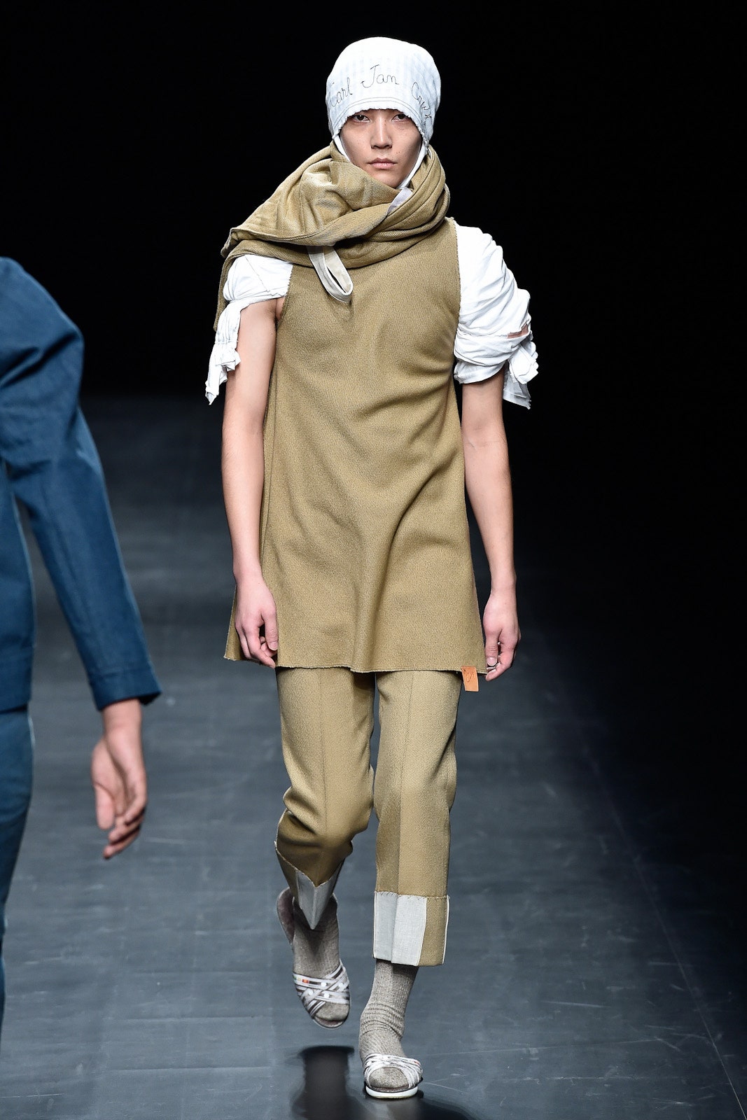 beige wool sleeveless top with pants