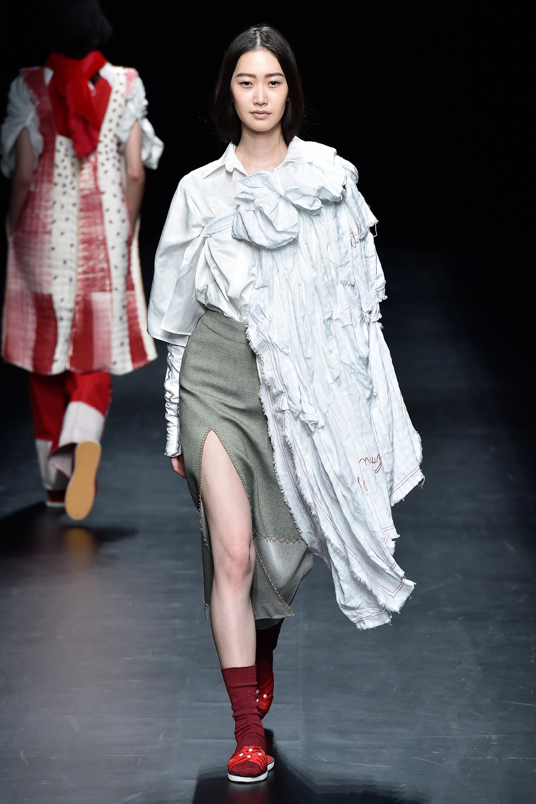 white relaxed shirt with gray skirt