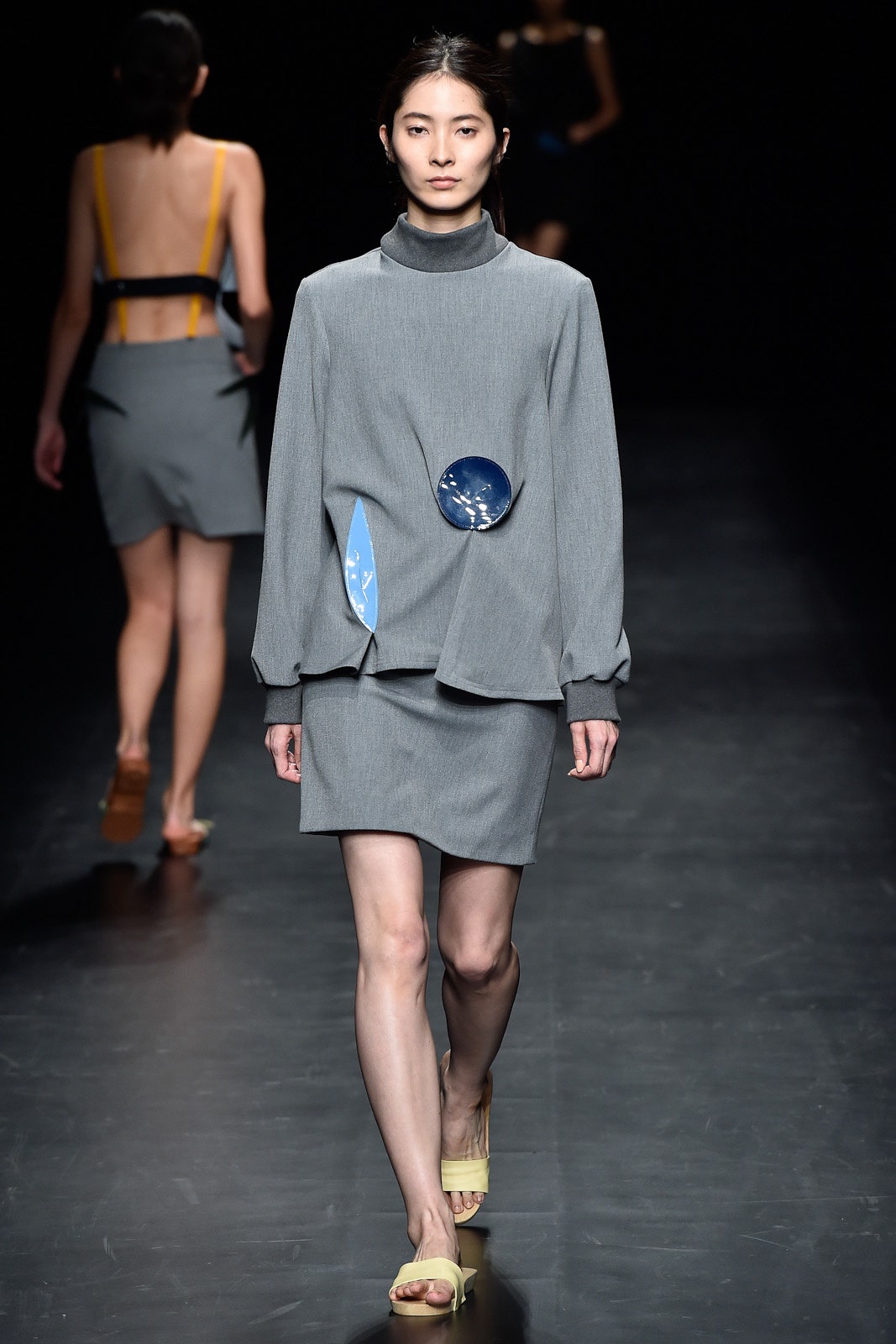 gray relaxed top and fitted skirt