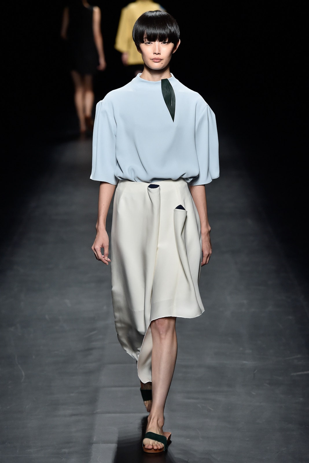 blue silk relaxed top with asymmetric white skirt