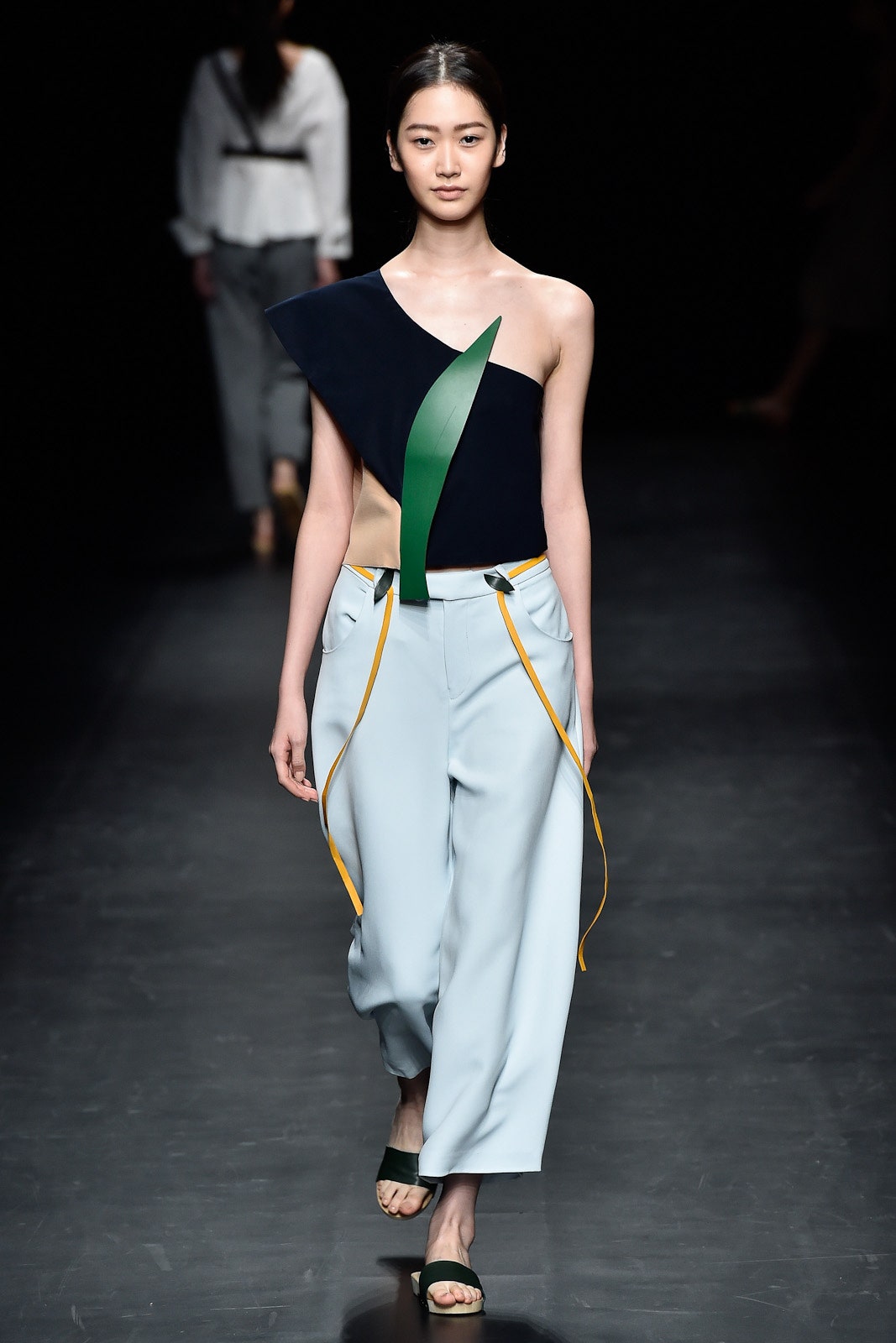 asymmetric blue top with relaxed pants