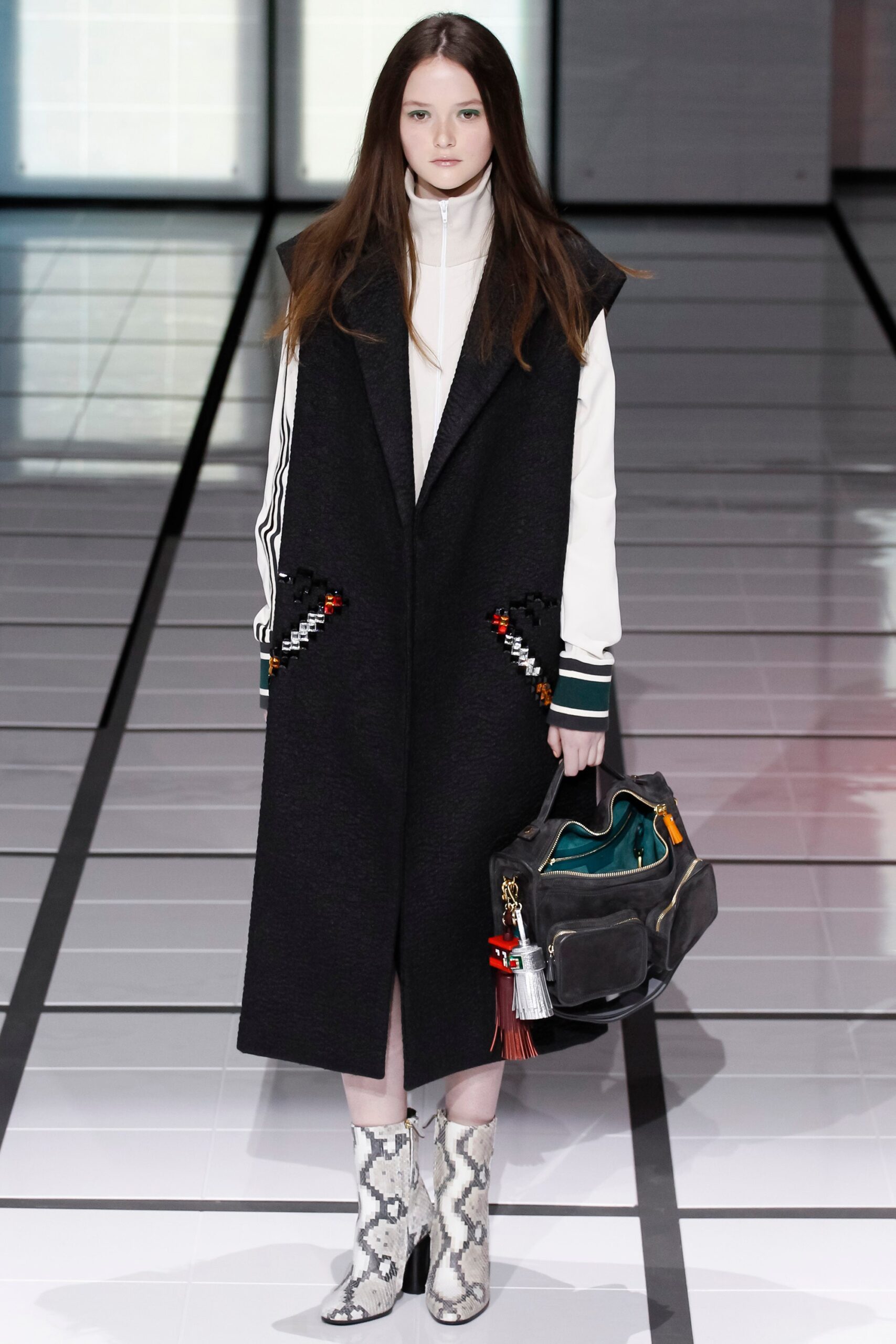 black wool coat with white top