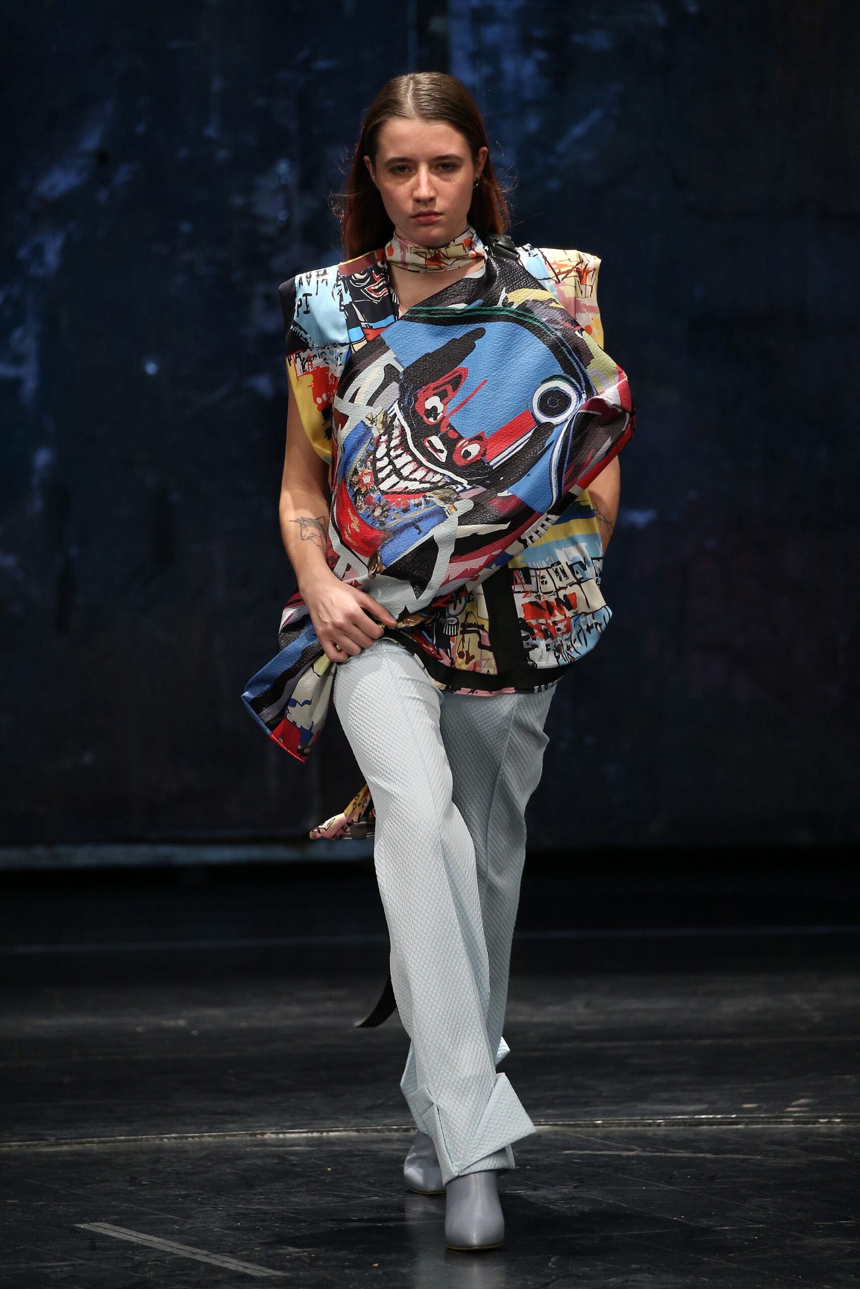 multi-colored sleeveless top with fitted pants