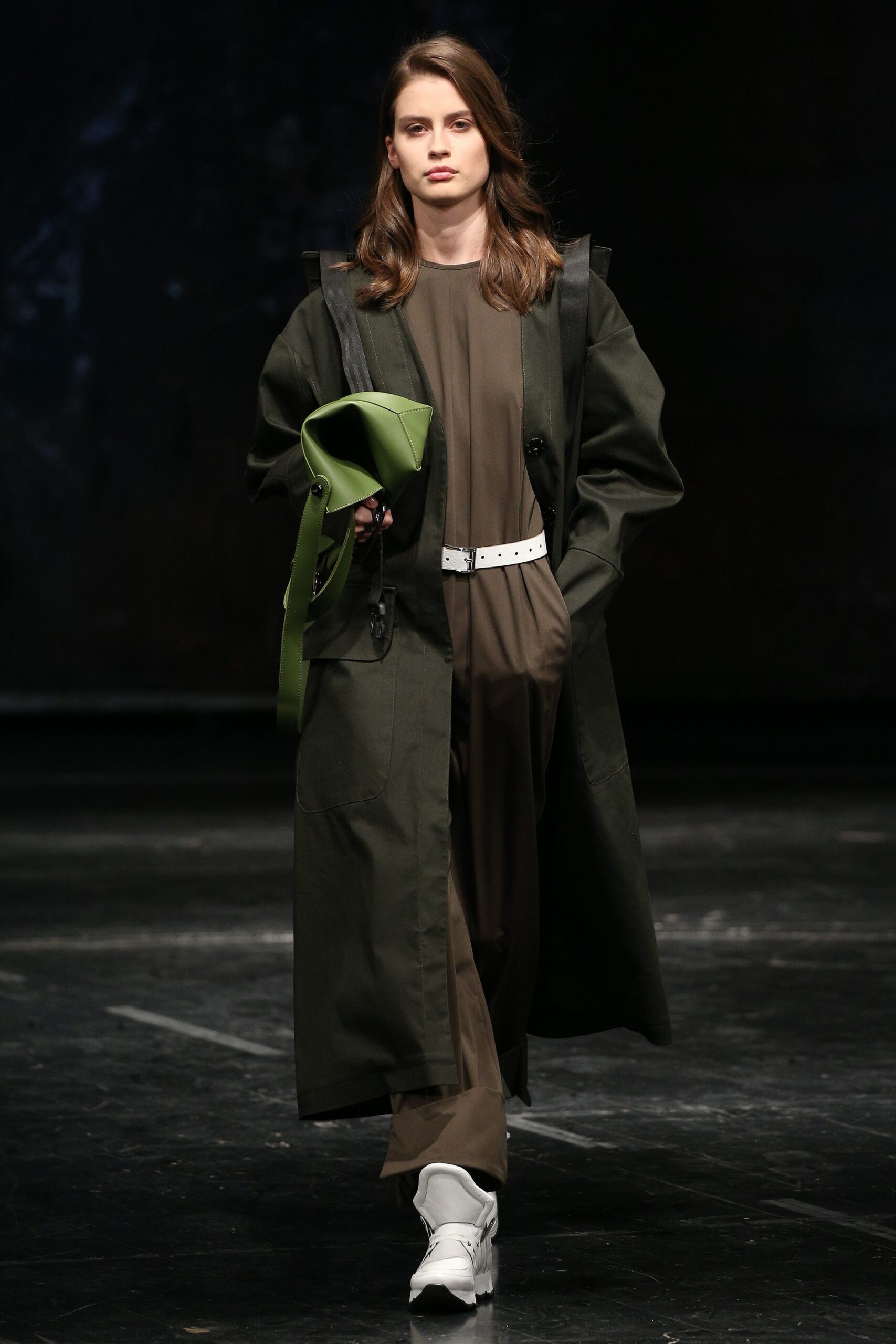 green coat brown jumpsuit