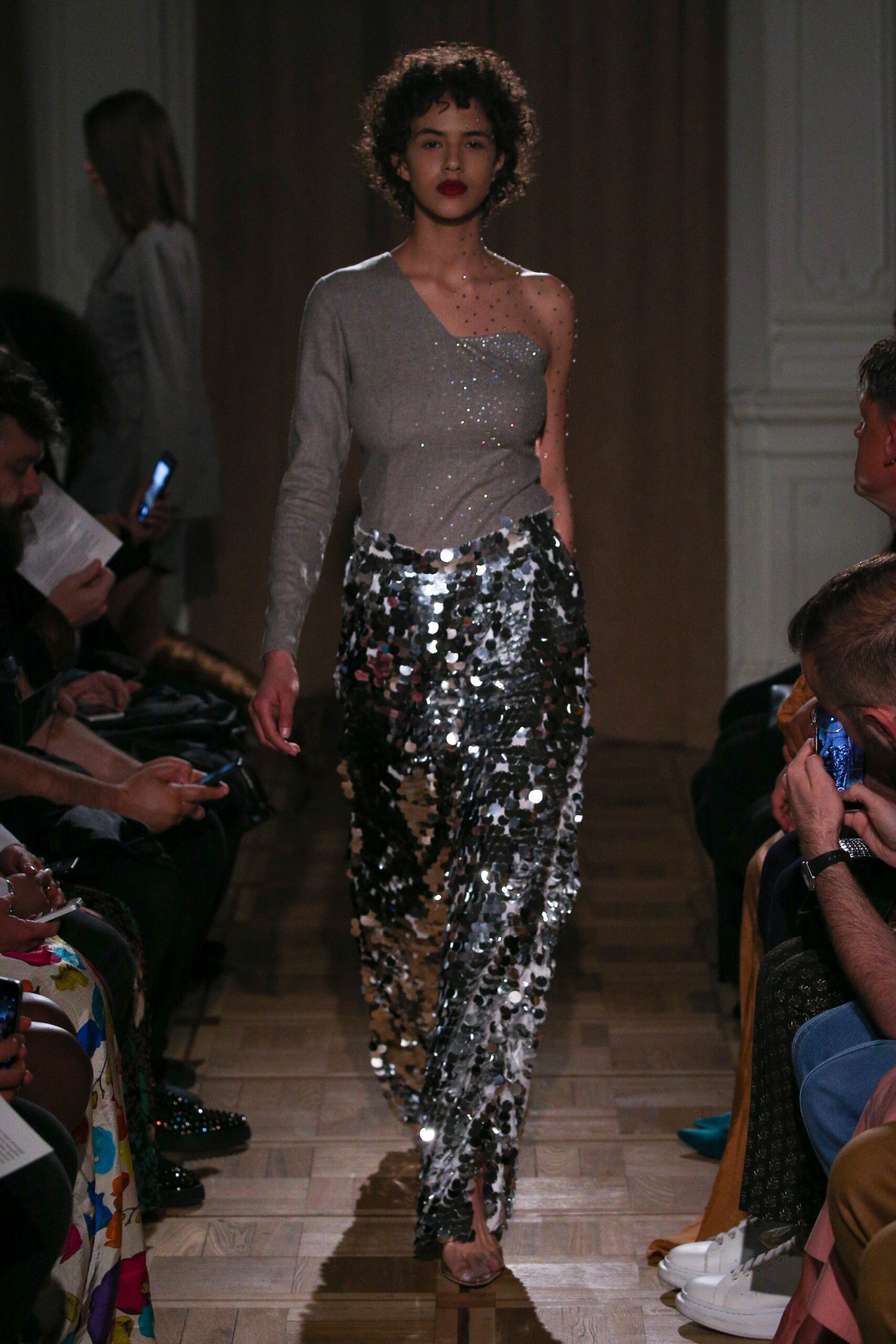 gray off-shoulder top with sequined pants