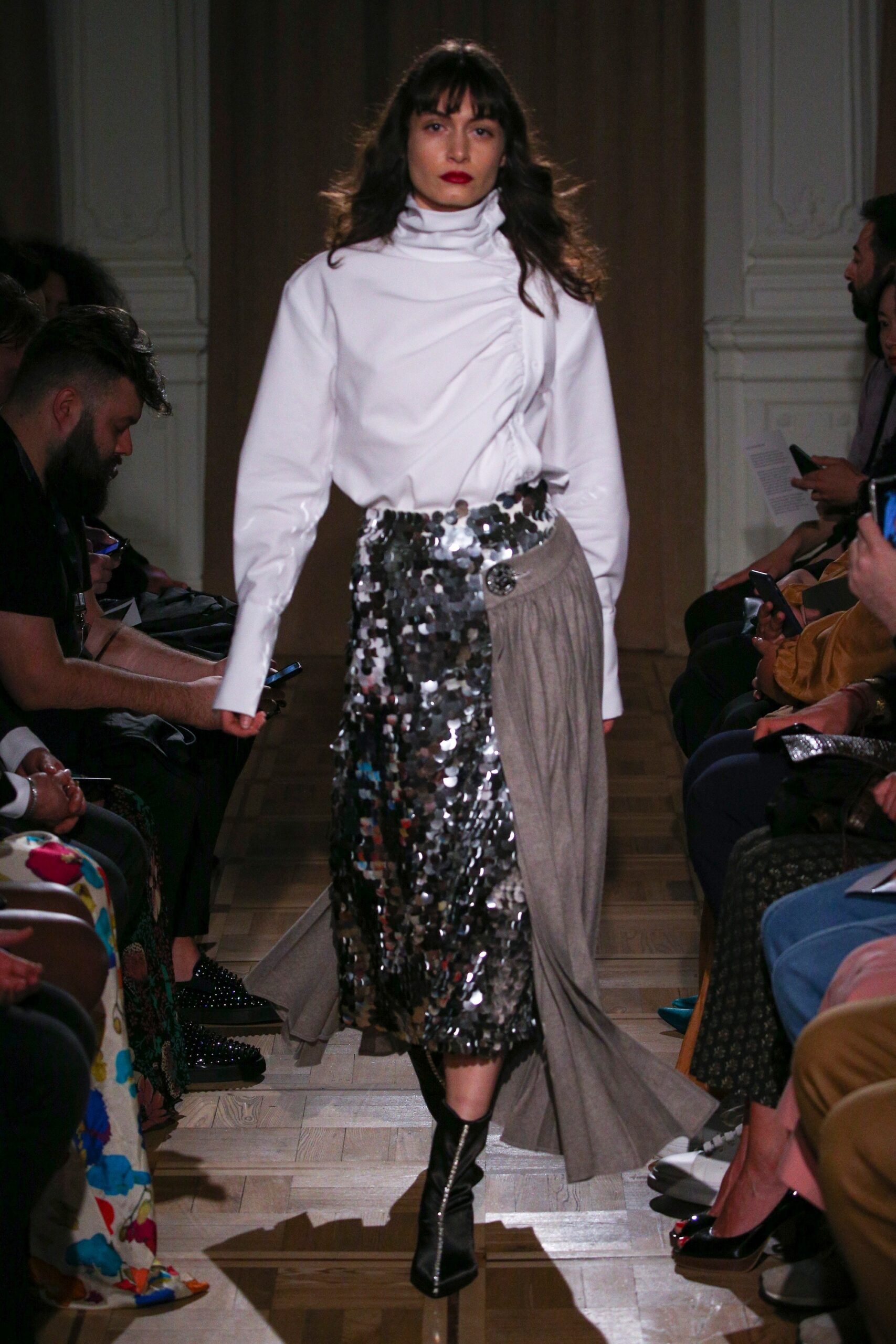 white fitted blouse and gray pleated skirt