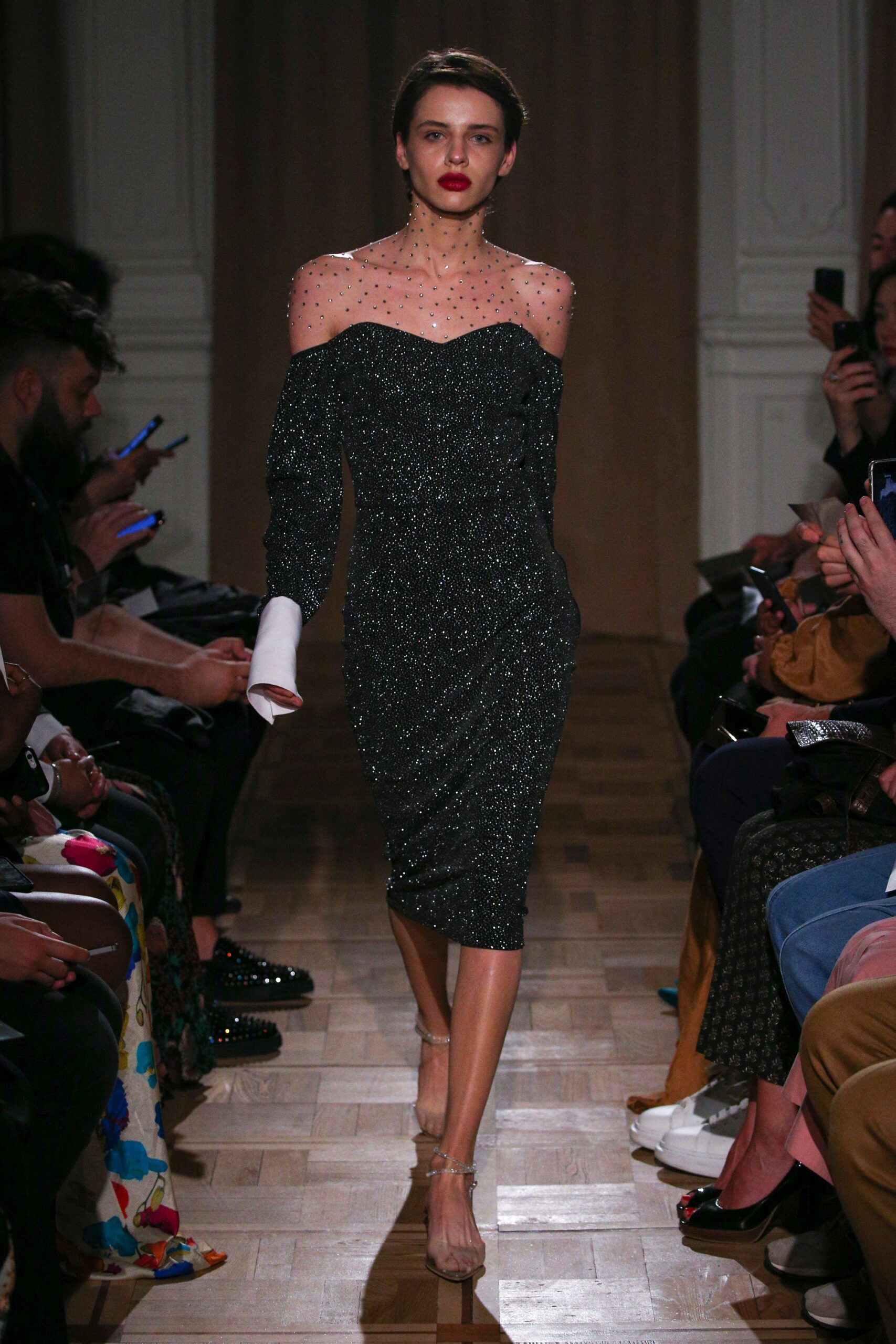 black sequined off-shoulder dress