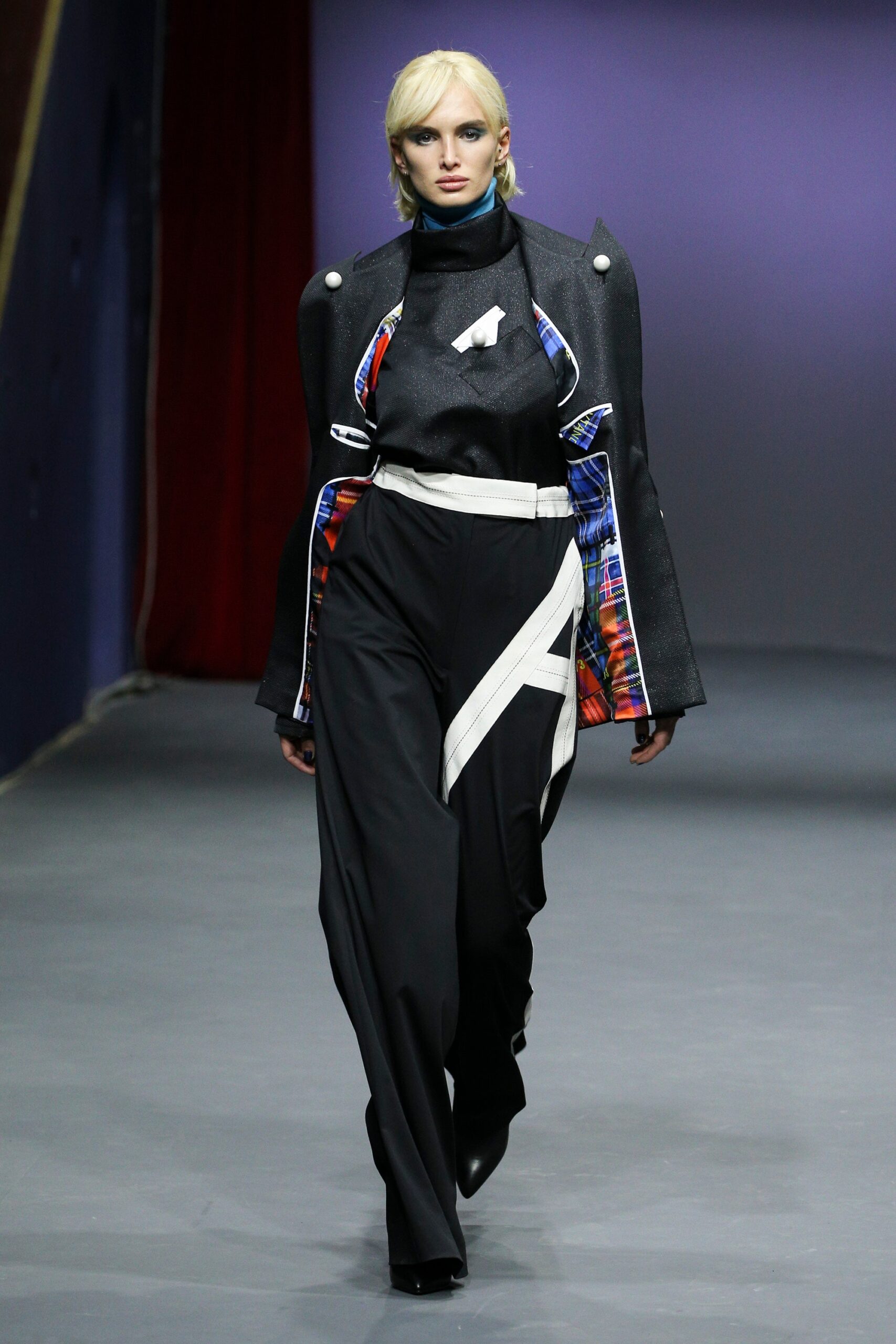 structured black jacket with tailored pants