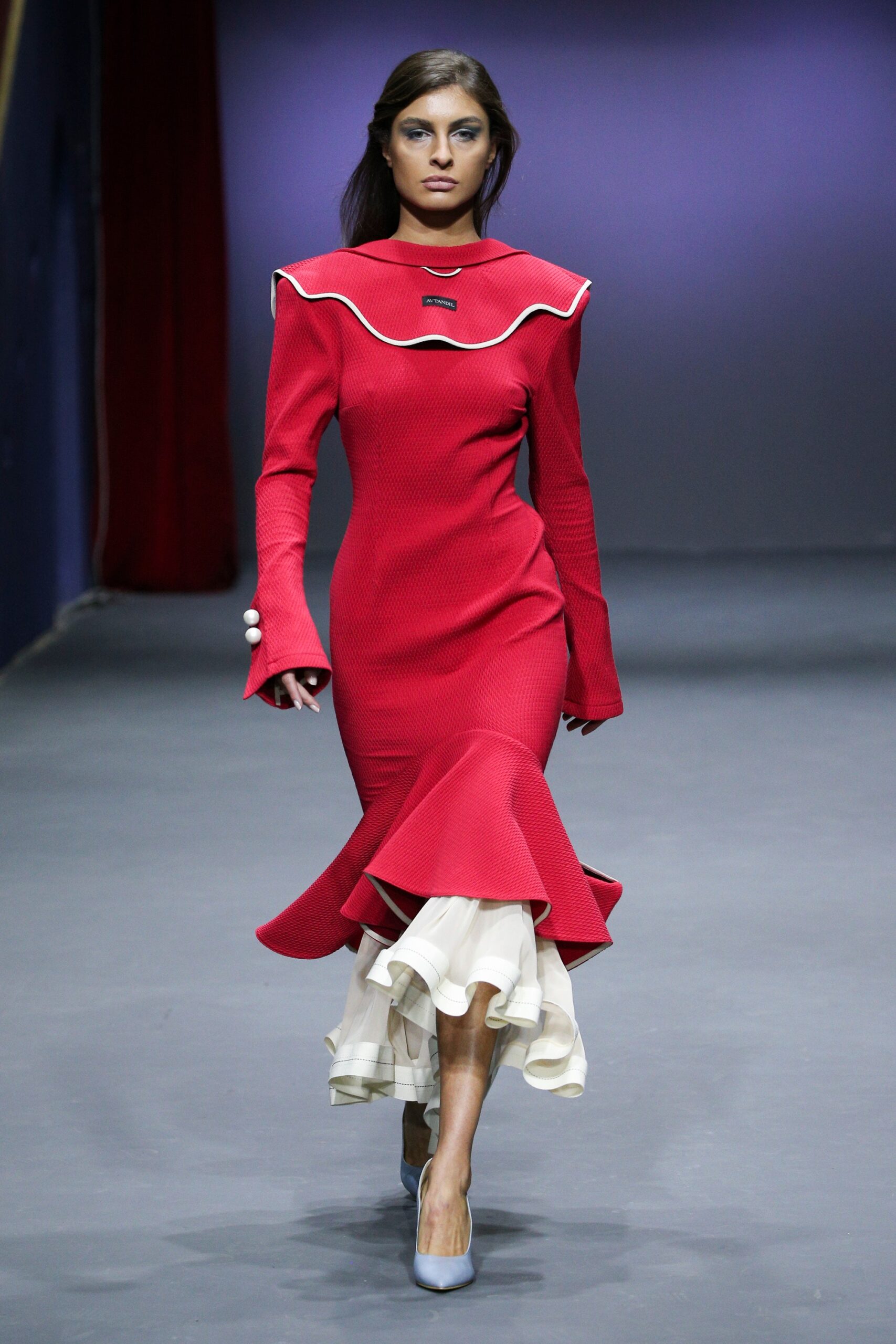 red fitted midi dress with flared hem