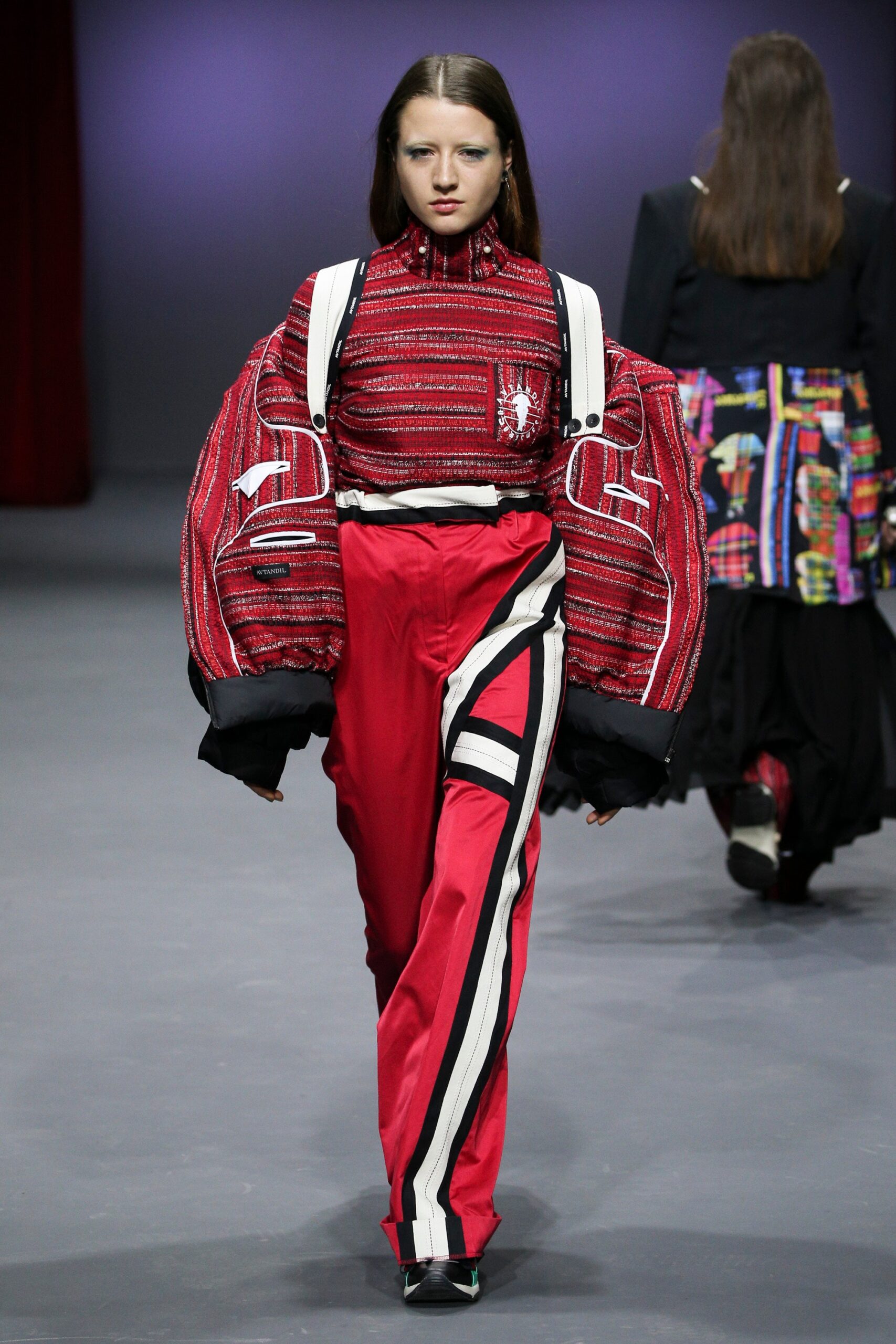 oversized red top with fitted pants