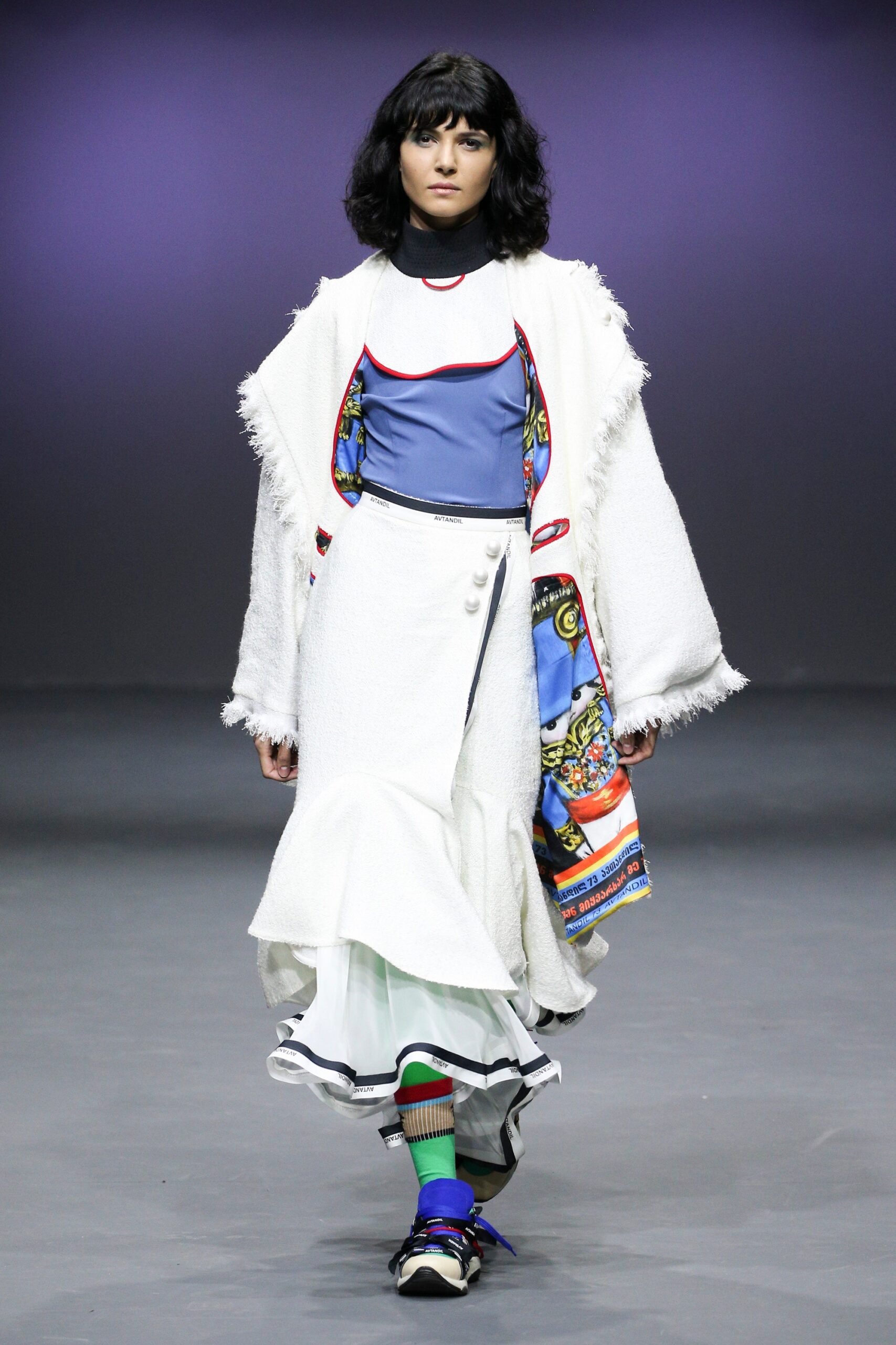 white relaxed coat with tiered dress