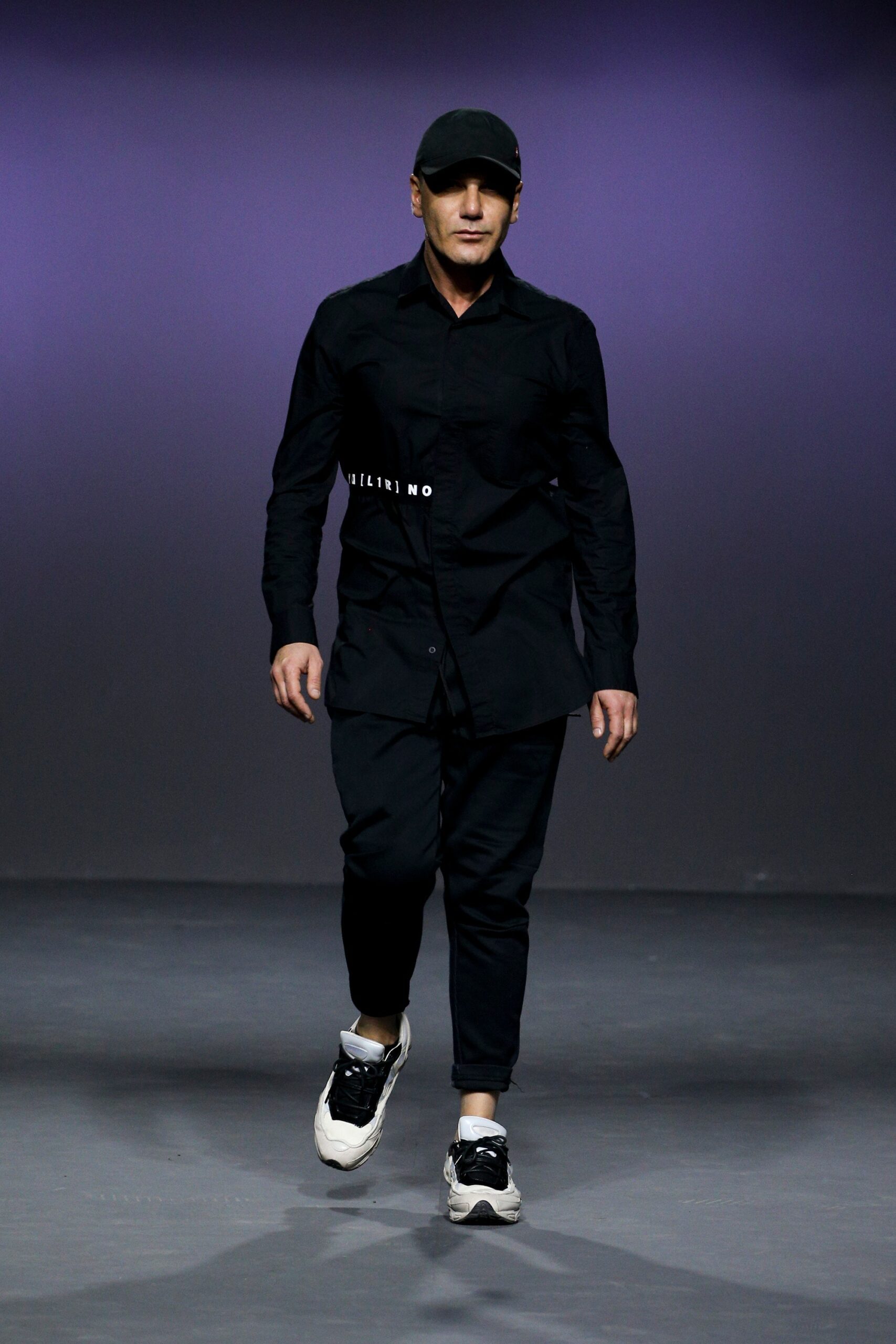 black fitted shirt and relaxed pants