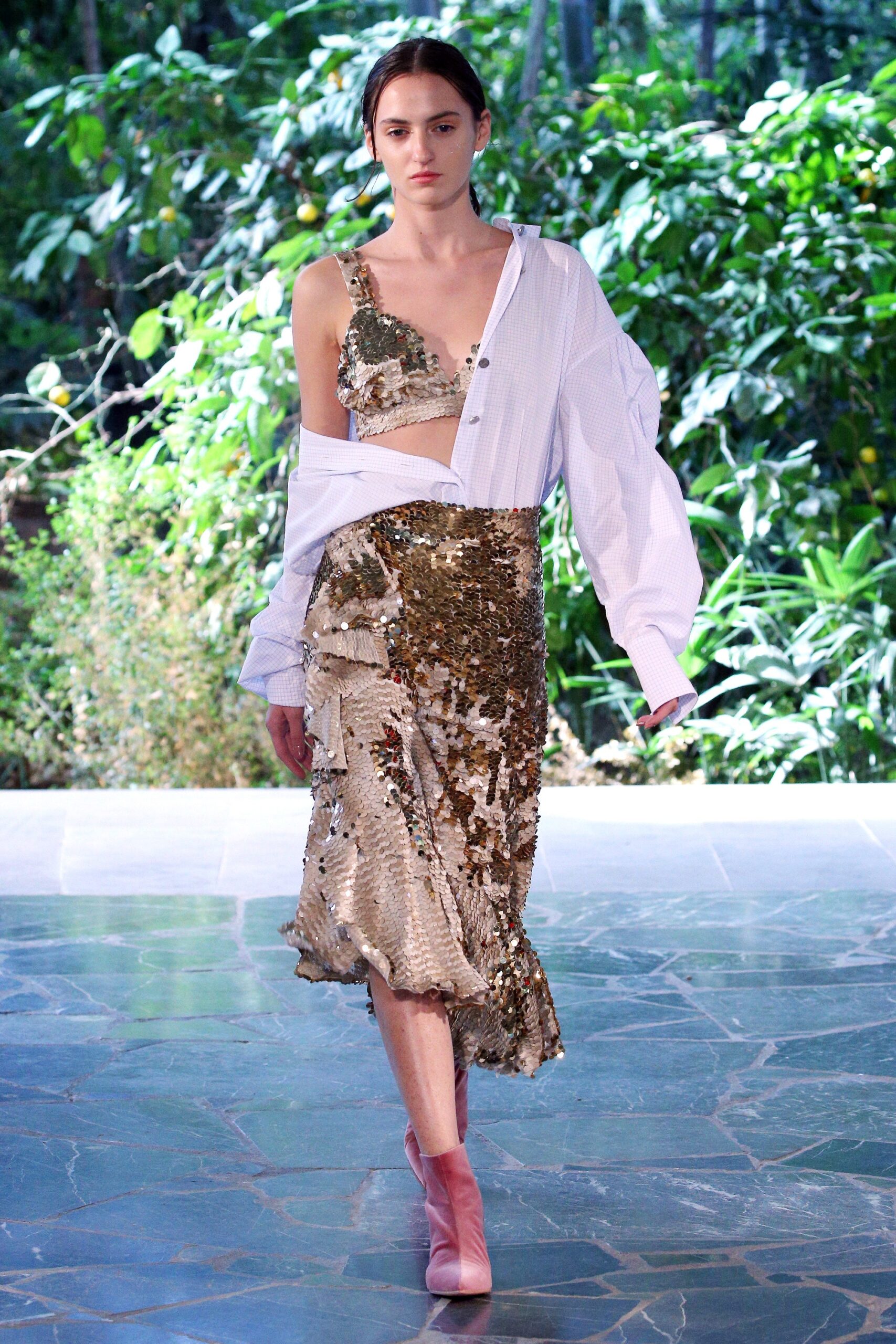 white relaxed top with gold skirt