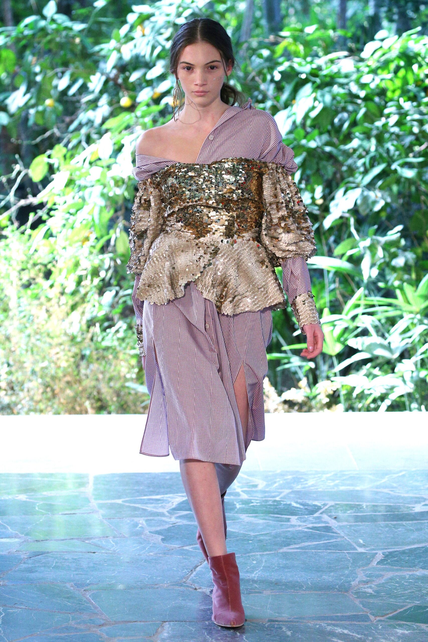 purple and gold asymmetric dress with red boots