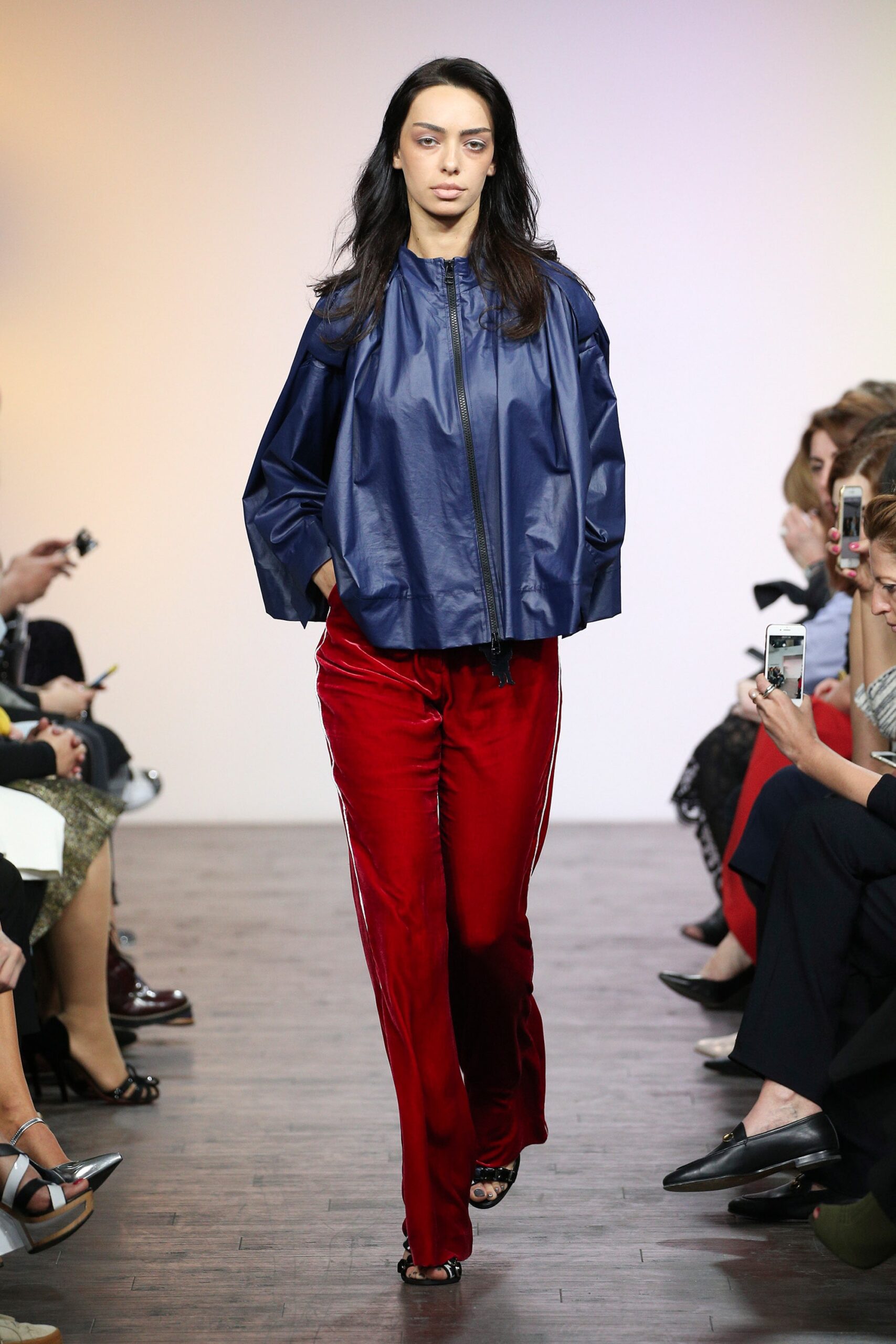 blue oversized jacket and red pants