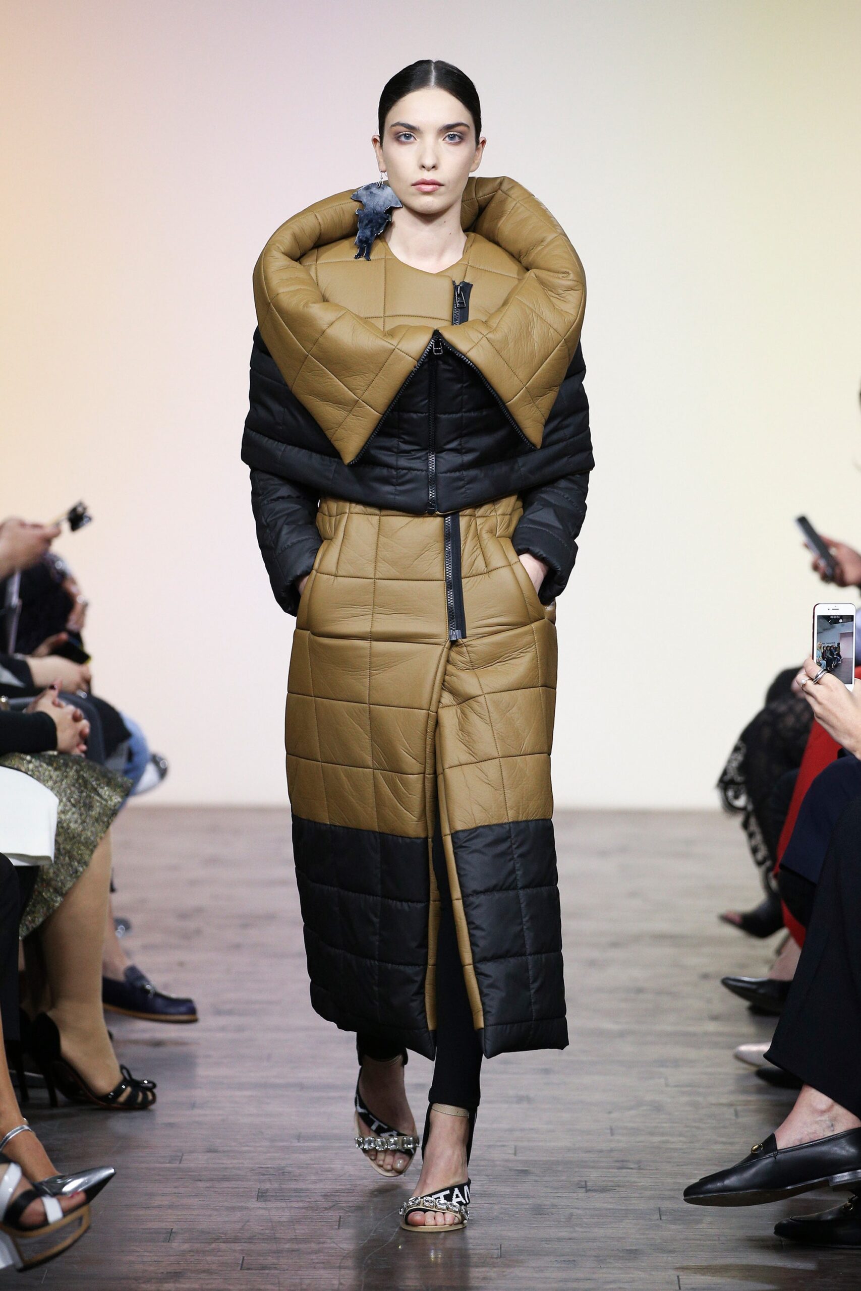 black and brown quilted coat