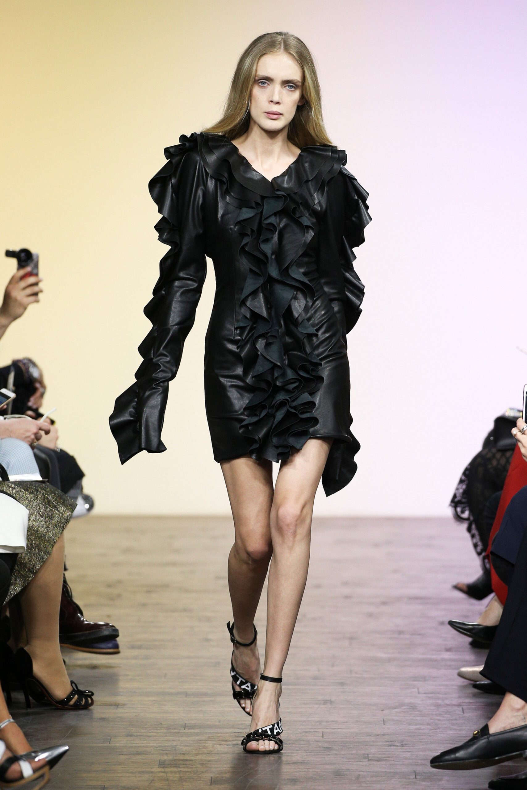 black leather ruffled mini dress