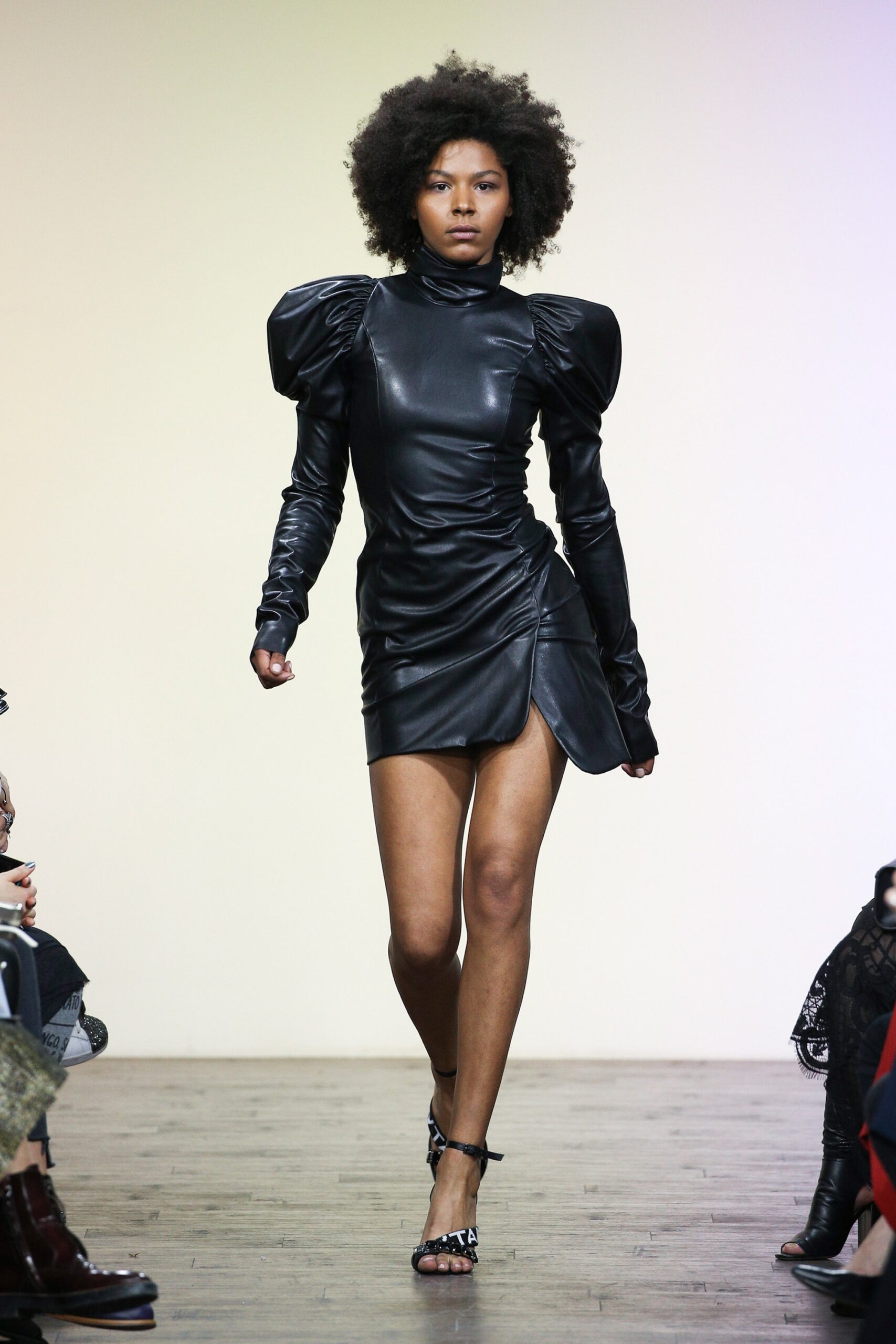 fitted black leather mini dress